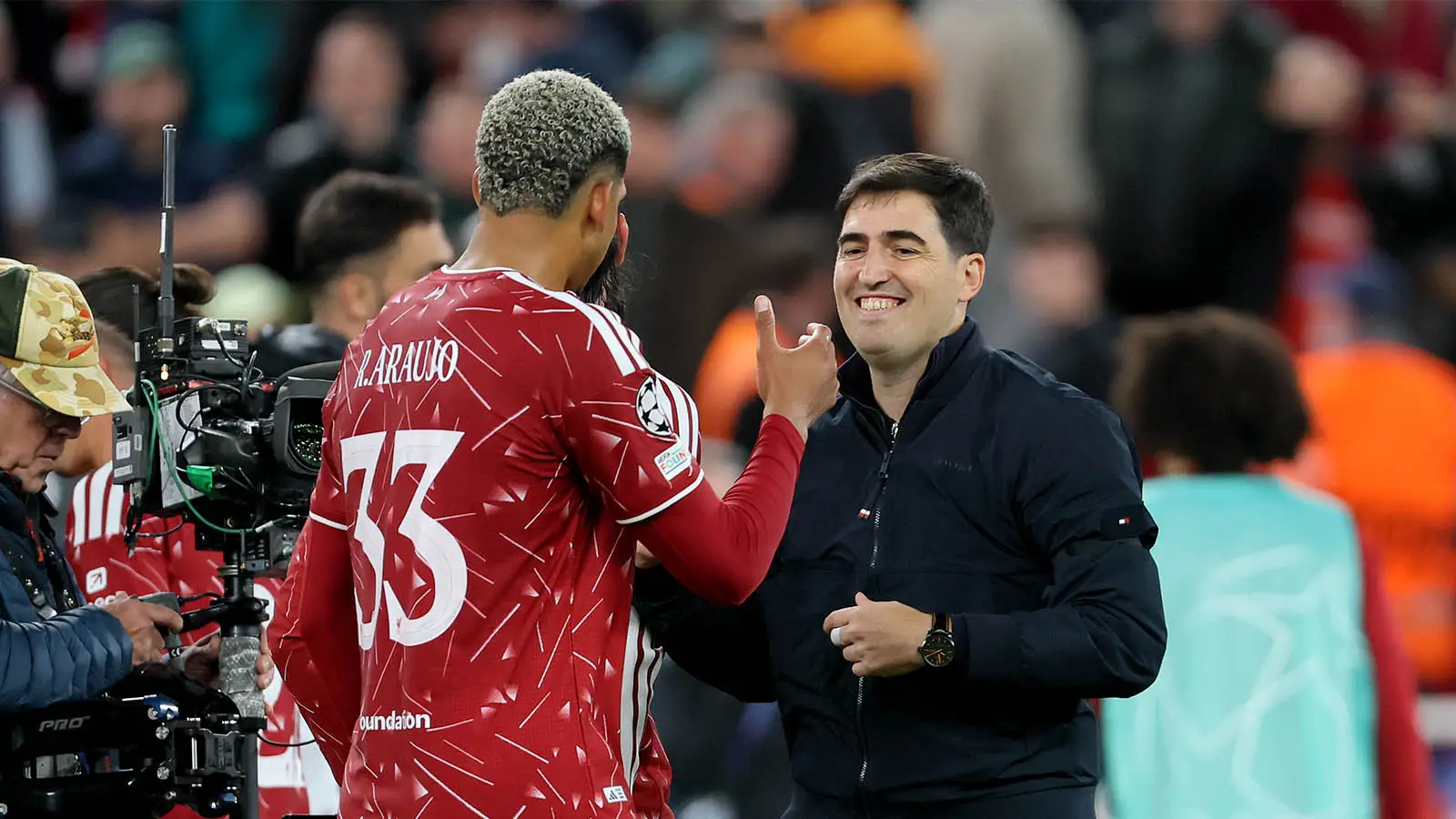 Liverpool head coach Andoni Iraola congratulates Ronald Araujo after the 2-1 Champions League win over Atletico Madrid (Image: Getty)