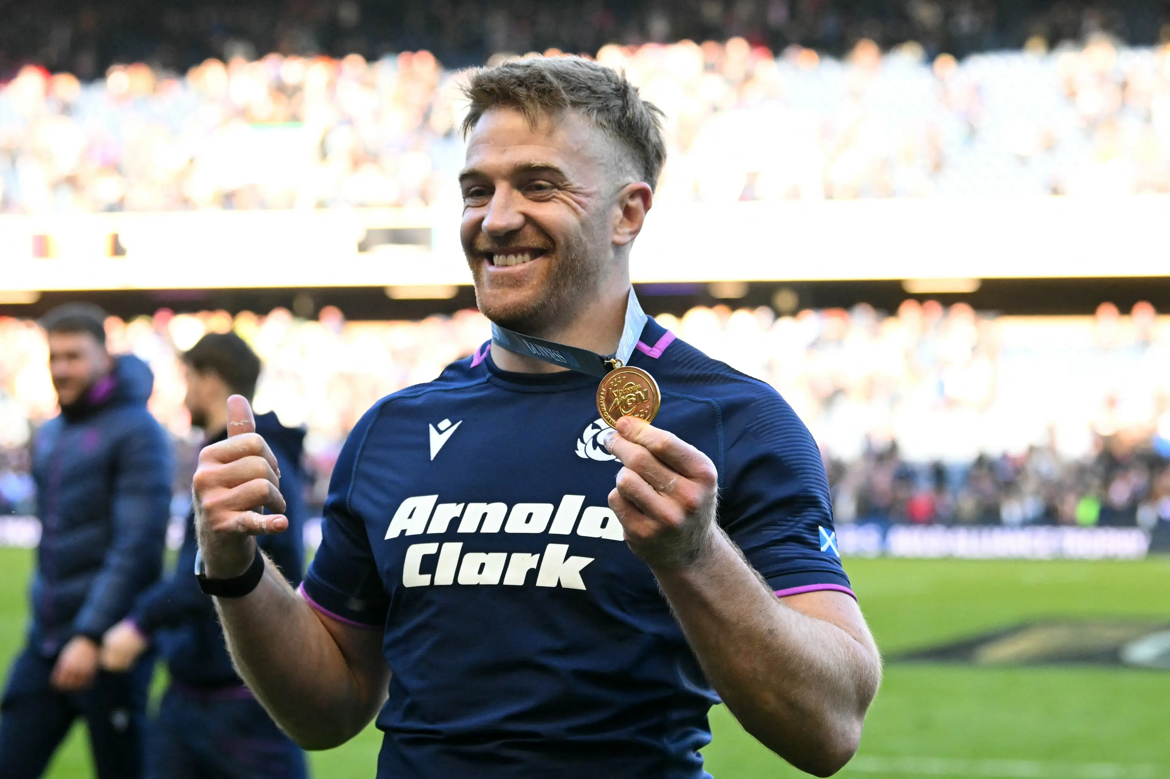 Scotland's wing Kyle Steyn poses with his man-of-the-match award after the Six Nations international rugby union match between Scotland and France (Getty Images)