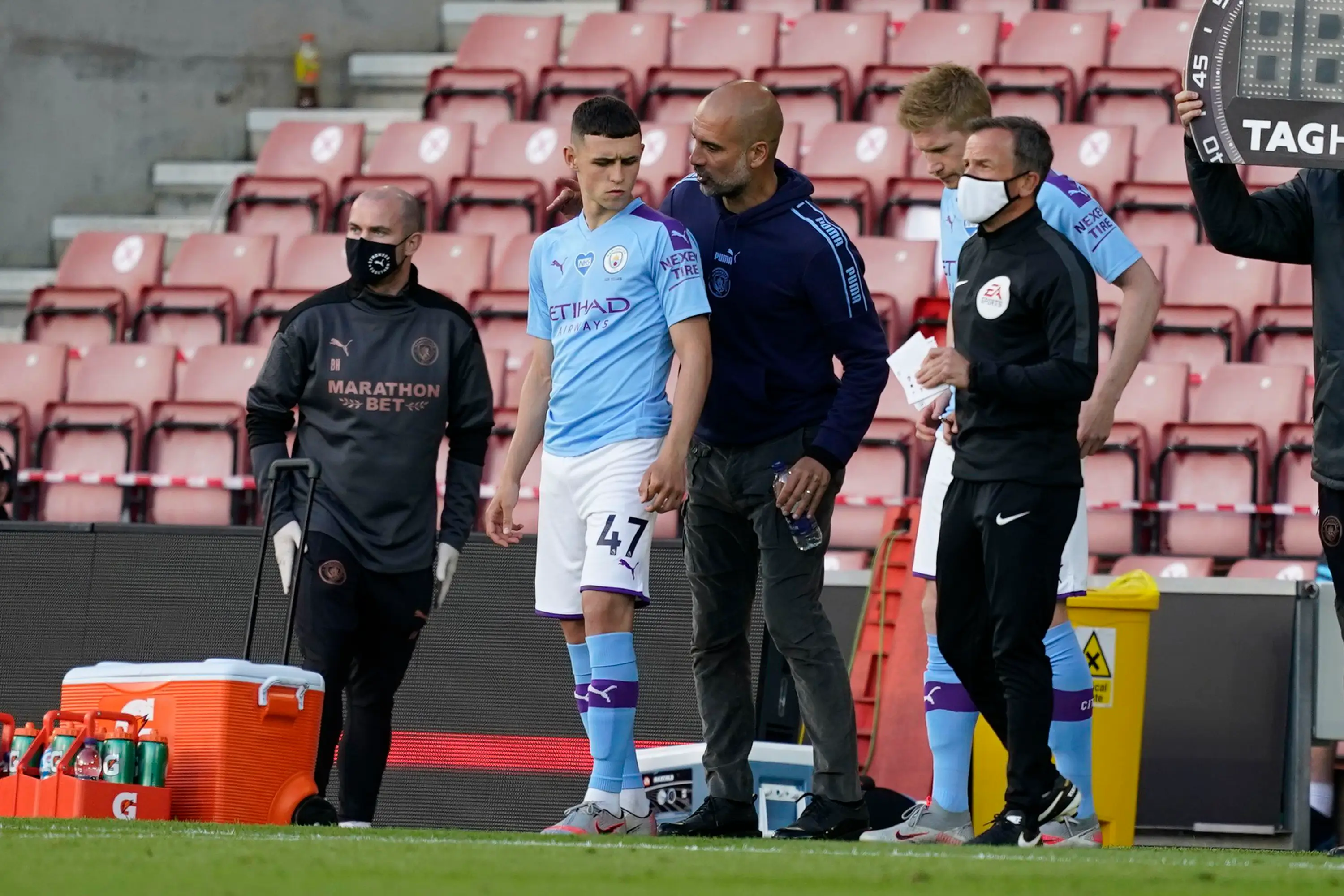 Phil Foden and Pep Guardiola in 2020- Getty
