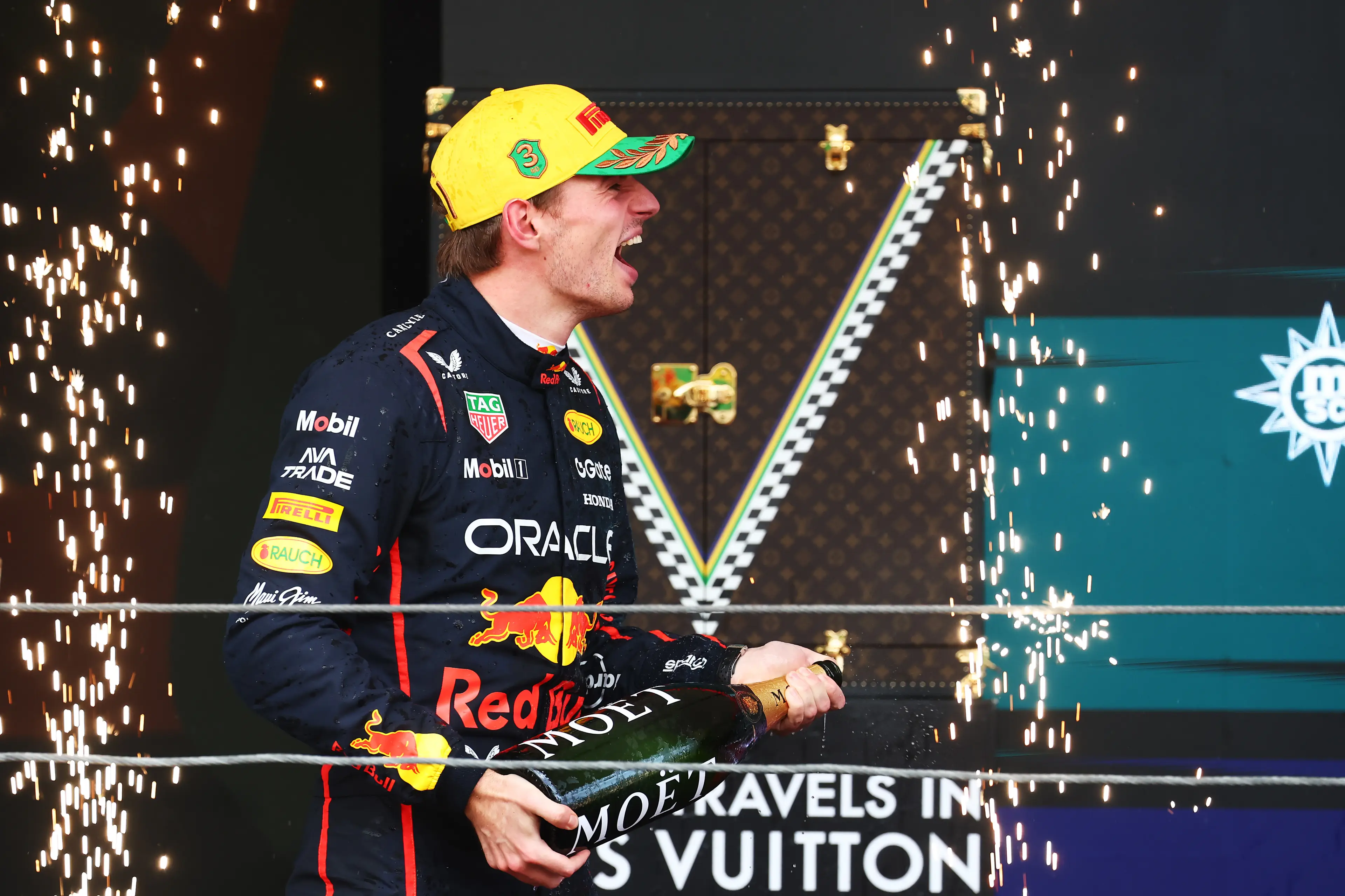 Max Verstappen on the Brazil podium (Image: Getty)