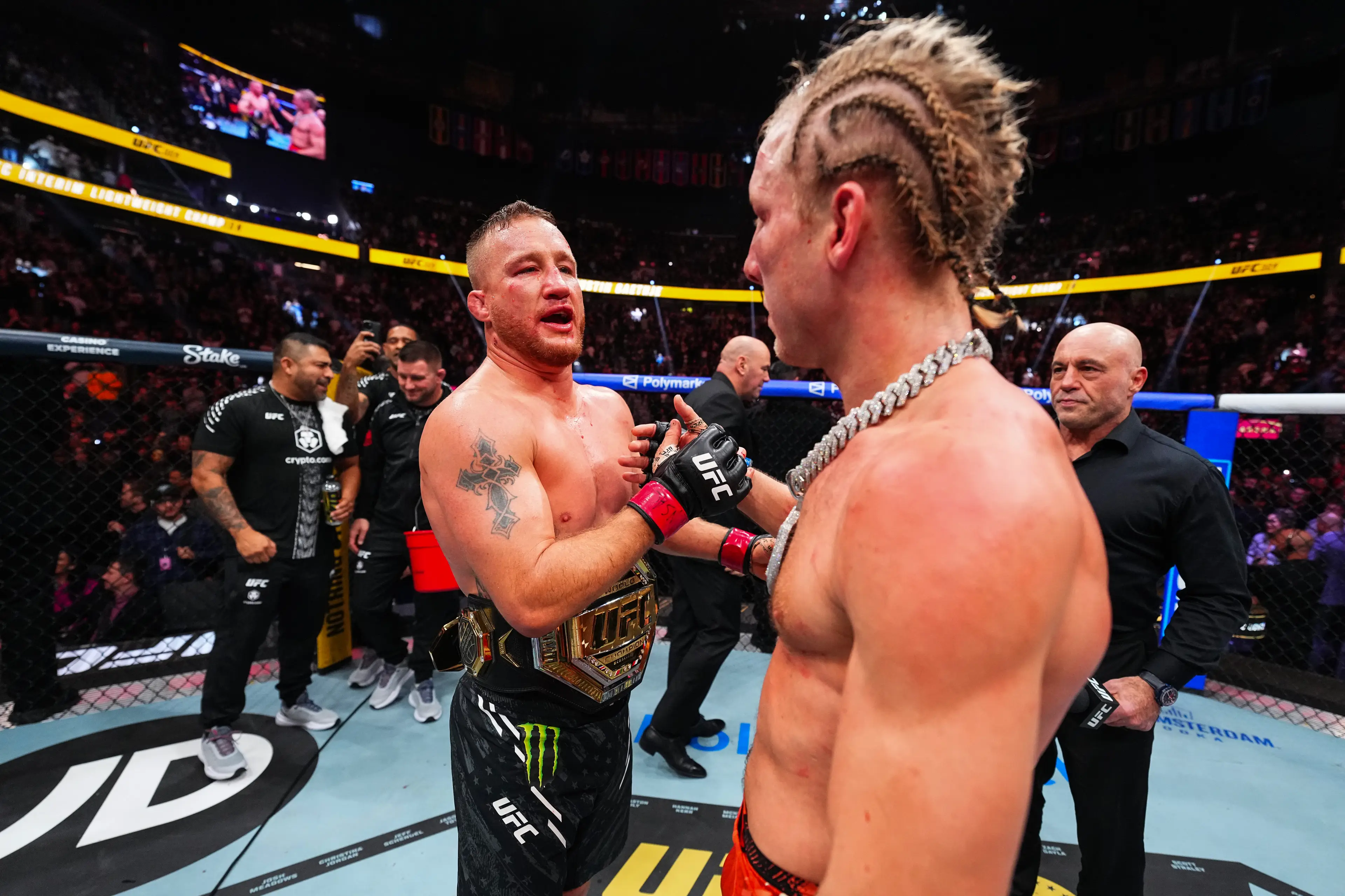 Justin Gaethje and Paddy Pimblett share a warm embrace after their UFC 324 war. Image: Getty 