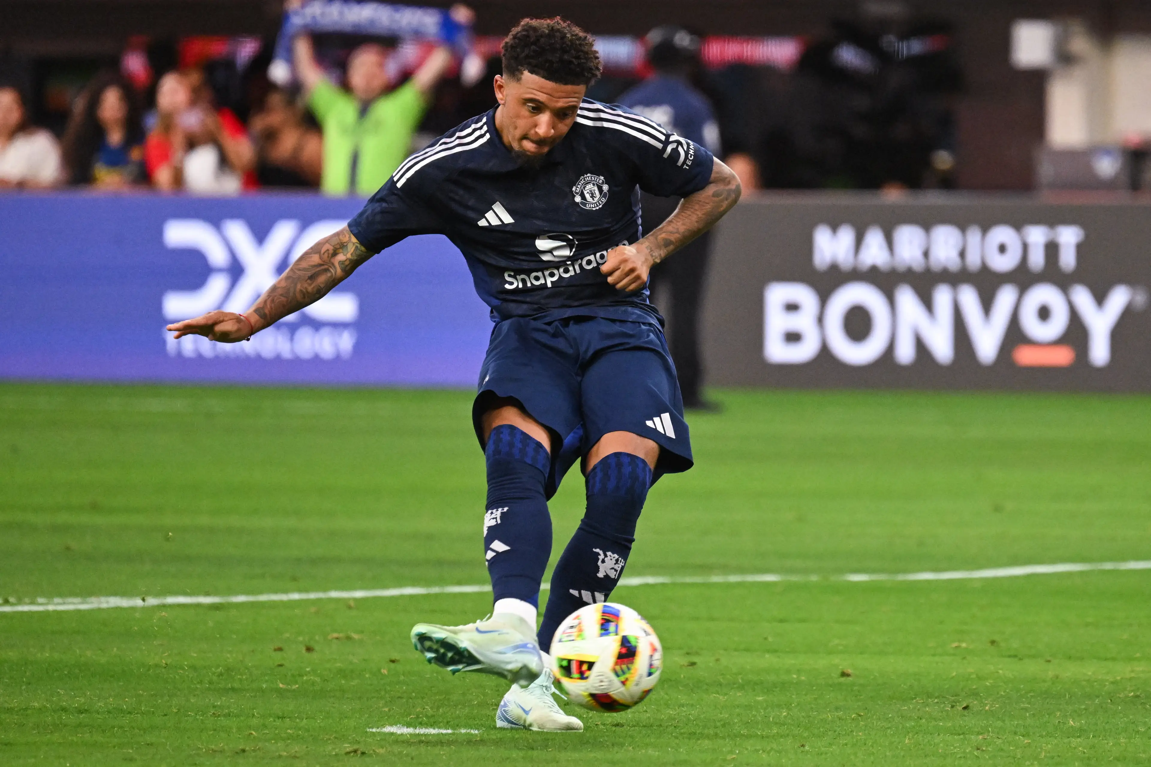 Jadon Sancho scored the winning spot kick in a penalty shootout against Arsenal. (