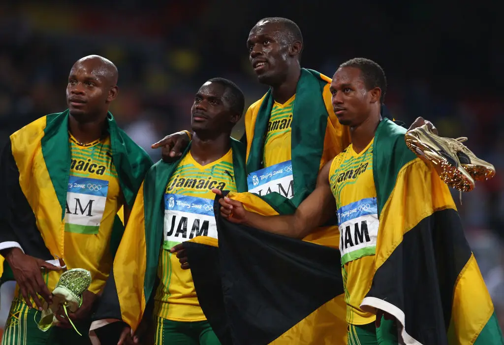 Asafa Powell (left), Nesta Carter (left of centre), Usain Bolt (right of centre) and Michael Frater (right) in 2008 (Credit:Getty)