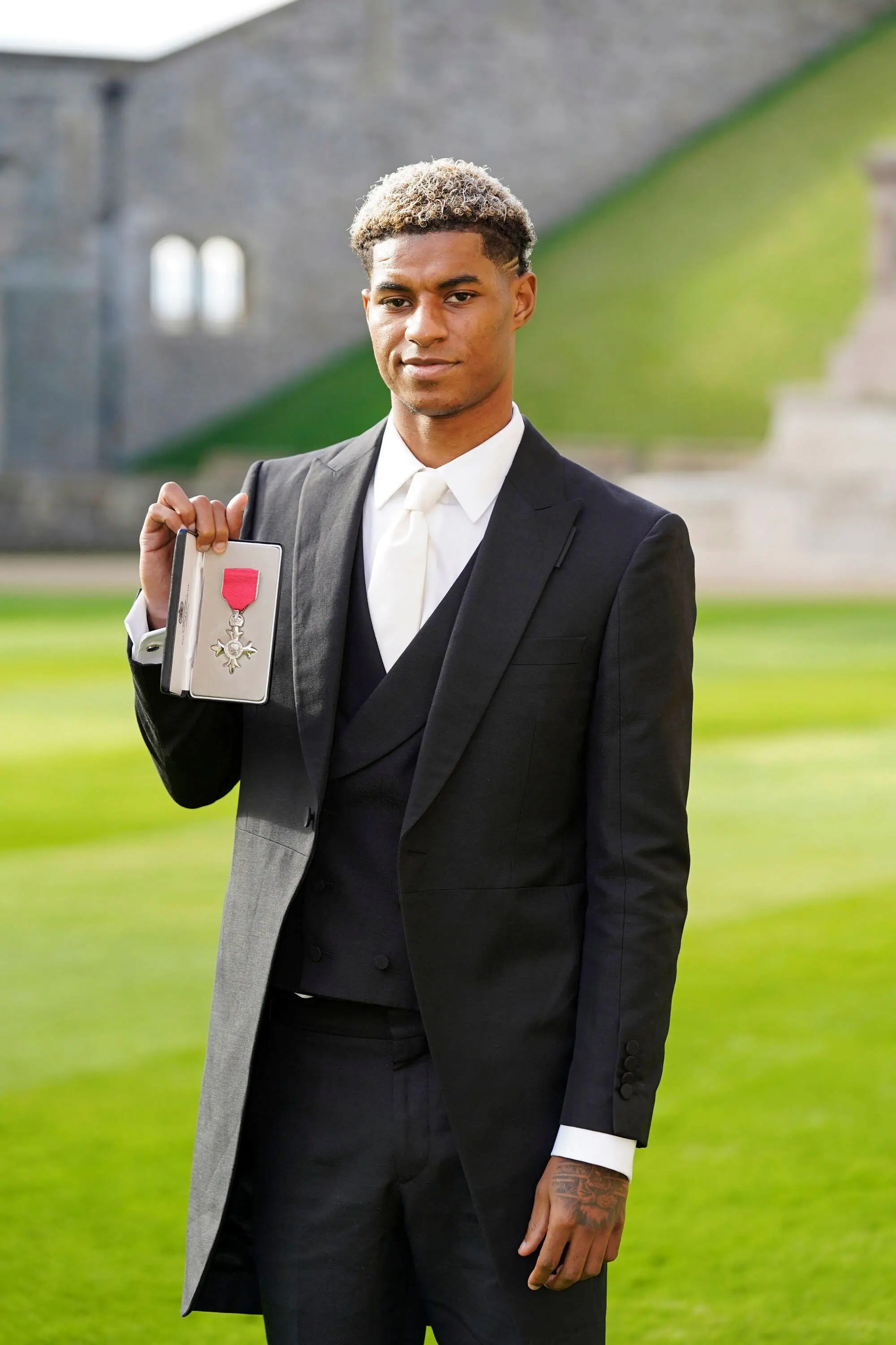Marcus Rashford was awarded an MBE for for services to vulnerable children in the UK during the coronavirus pandemic. (Alamy)