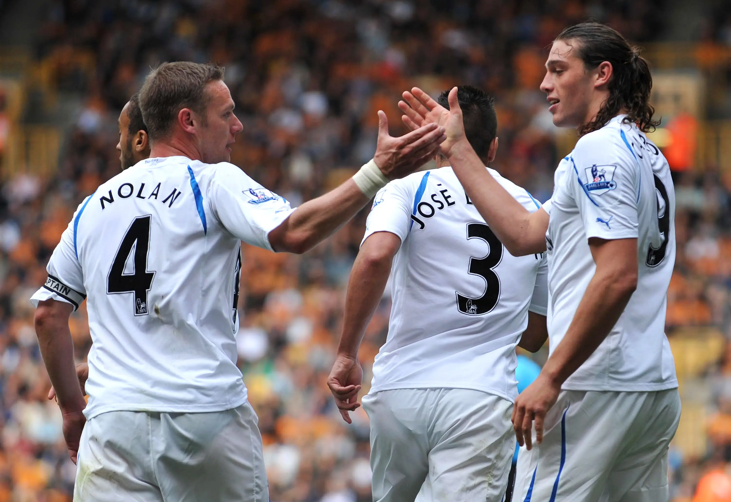Andy Carroll (R) of Newcastle United celebrates with team mate Kevin Nolan (L) after scoring the equaliser during the Barclays Premier League  (Getty Images)
