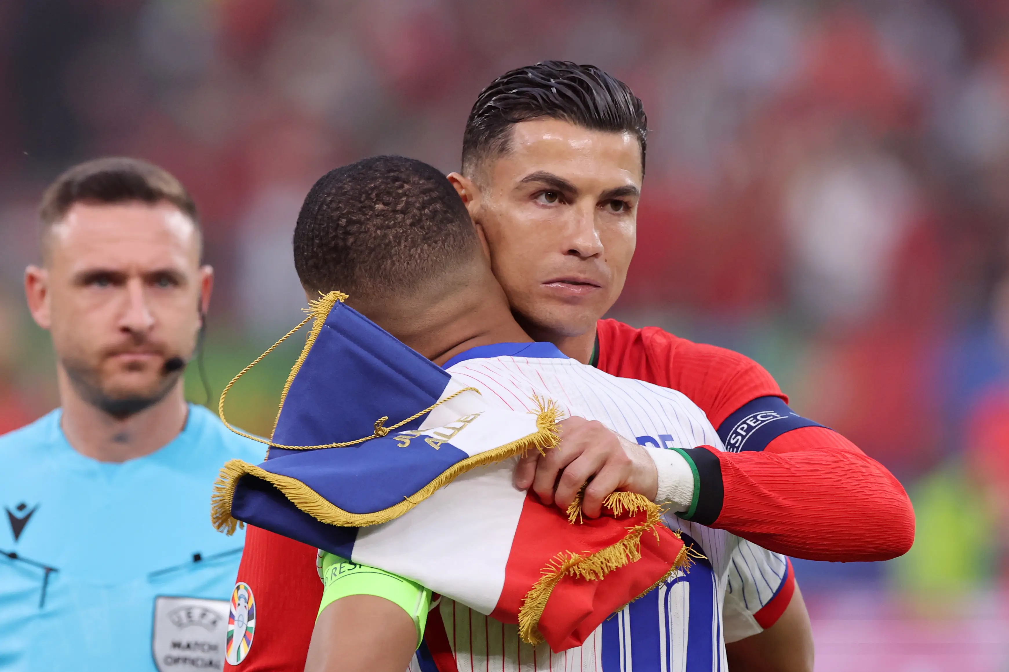 Ronaldo and Mbappe embrace at Euro 2024. Image credit: Getty