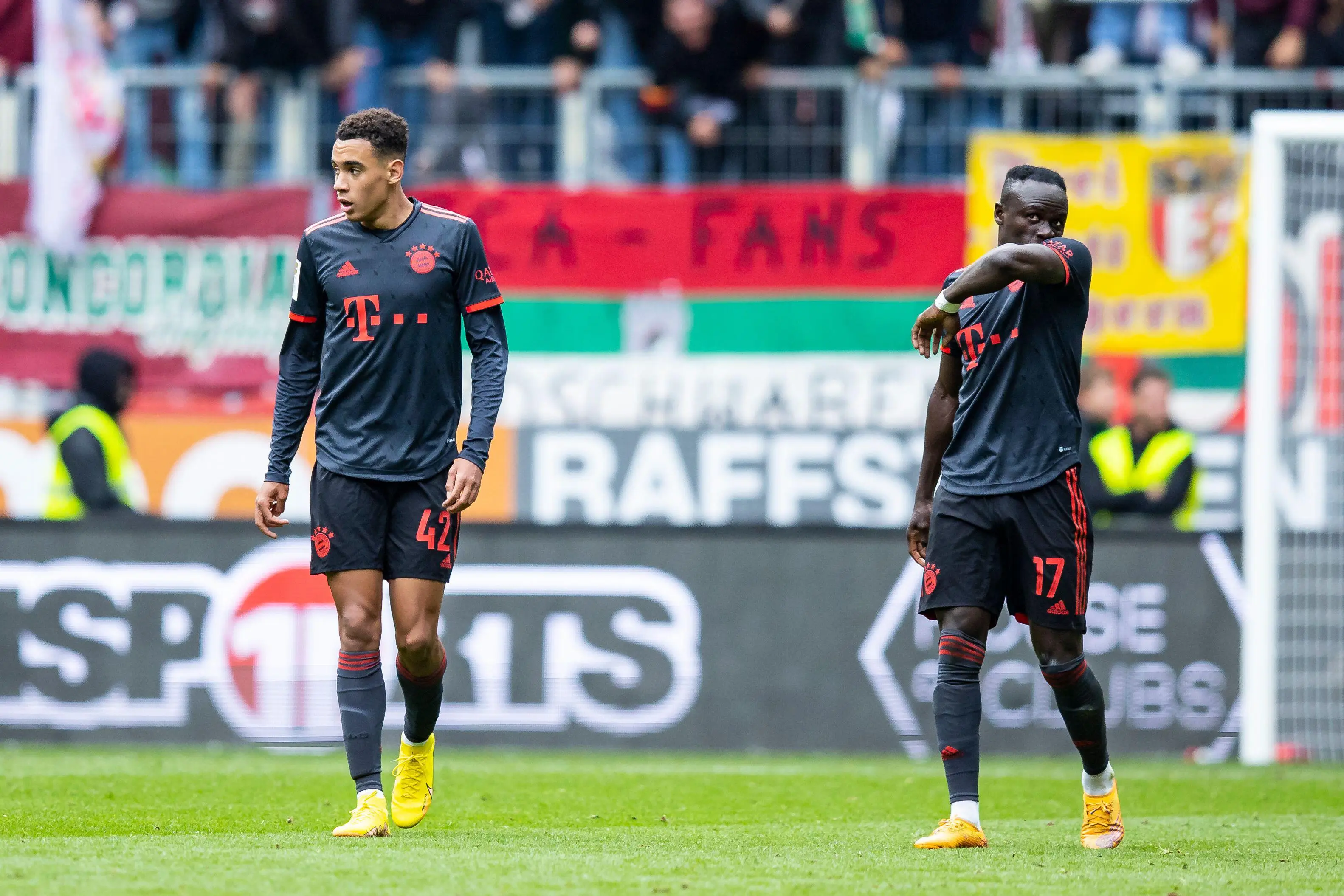 Bayern players after Augsburg's goal. Image: Alamy
