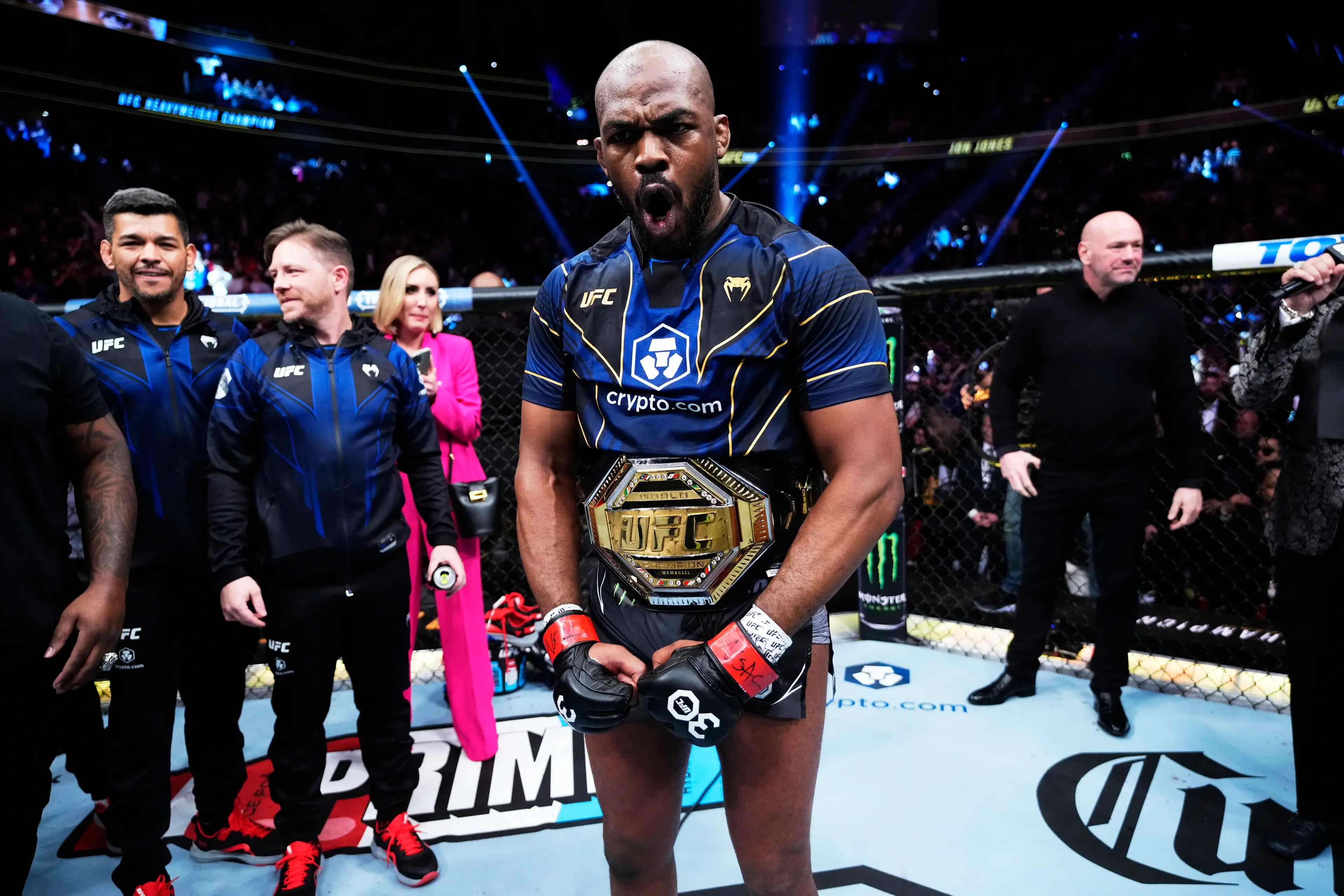Jon Jones celebrates winning the UFC heavyweight title. (Image: Getty)