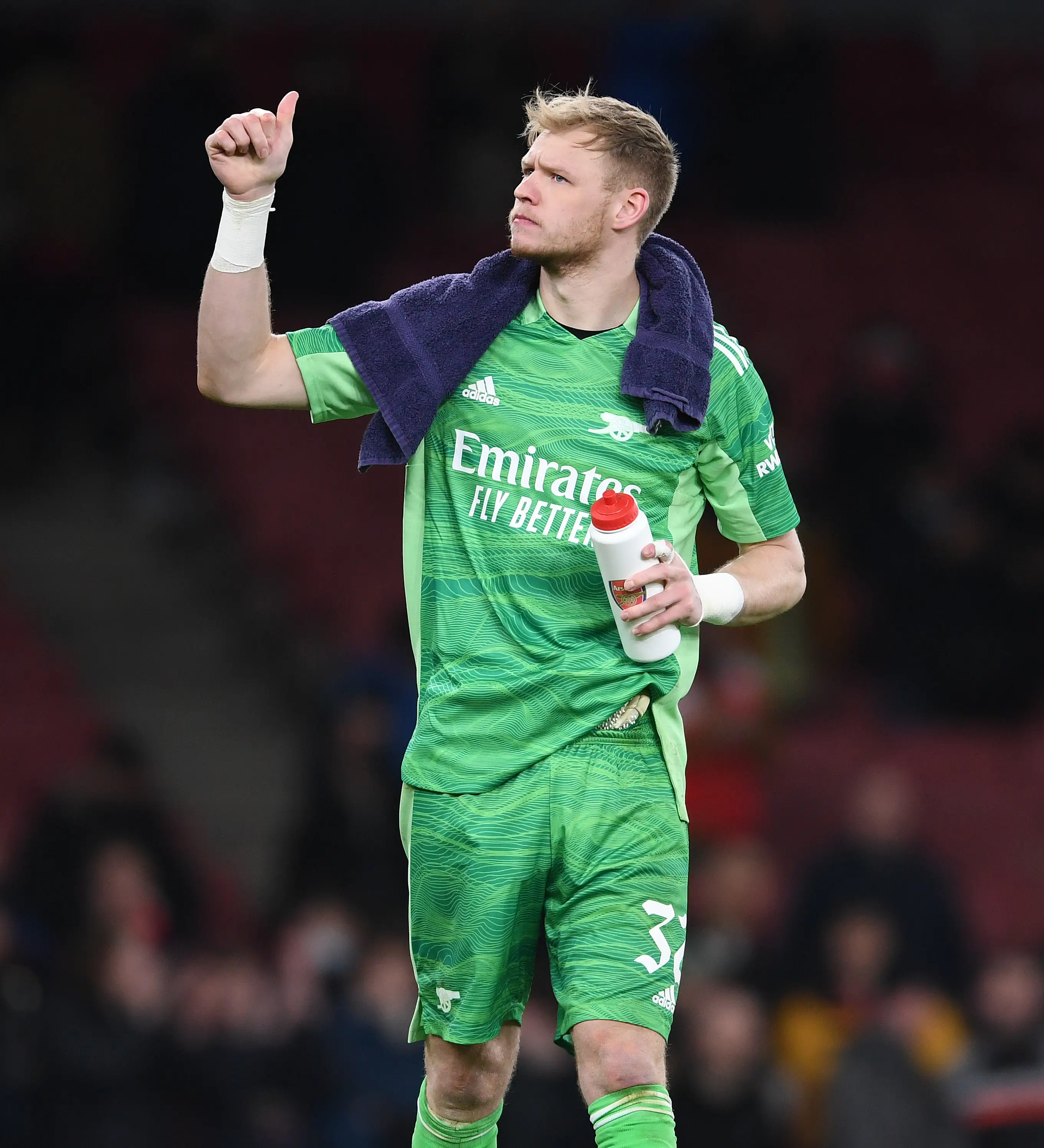 Aaron Ramsdale signals his approval to the crowd. Image credit: Getty
