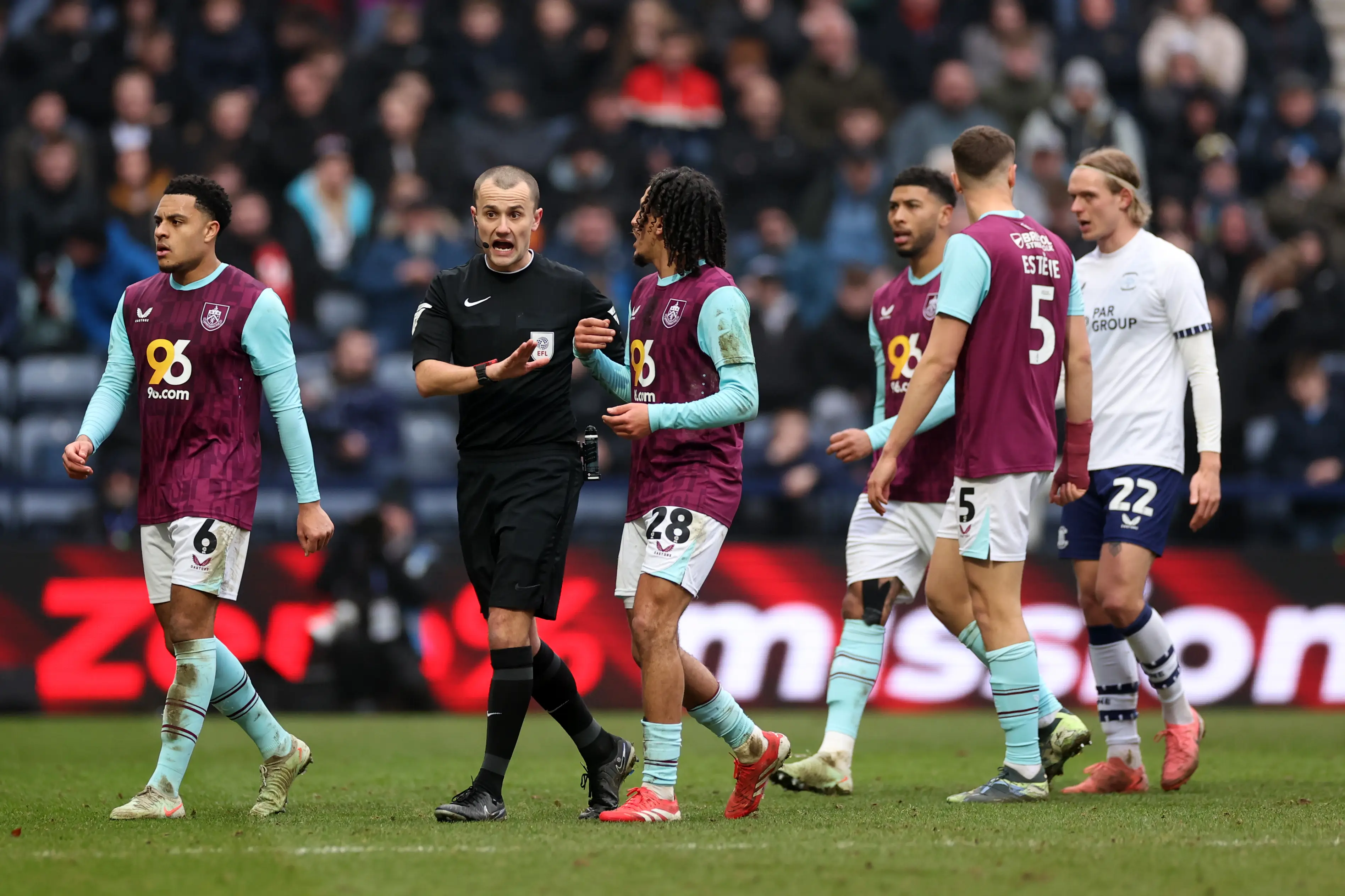 Referee Andrew Kitchen and Hannibal Mejbri after the incident. Image credit: Getty