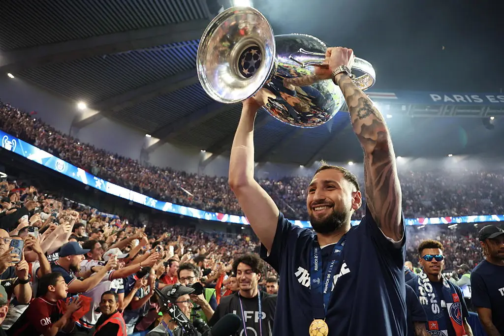 Gianluigi Donnarumma celebrates after winning the Champions League trophy with PSG (Image: Getty)