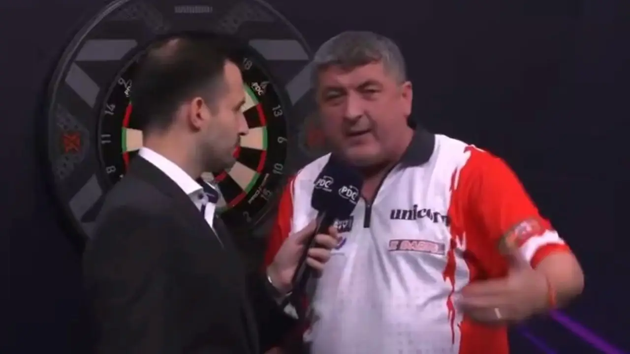 Mensur Suljovic speaking during the Swiss Darts Trophy (Image: PDC)