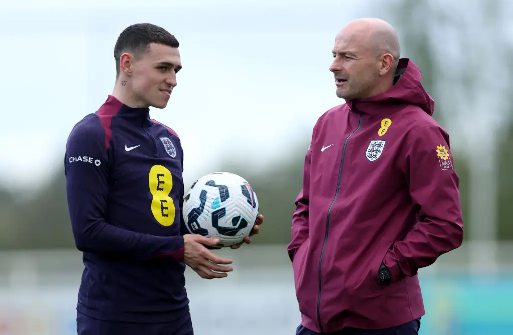 Phil Foden and England manager Lee Carsley pictured -