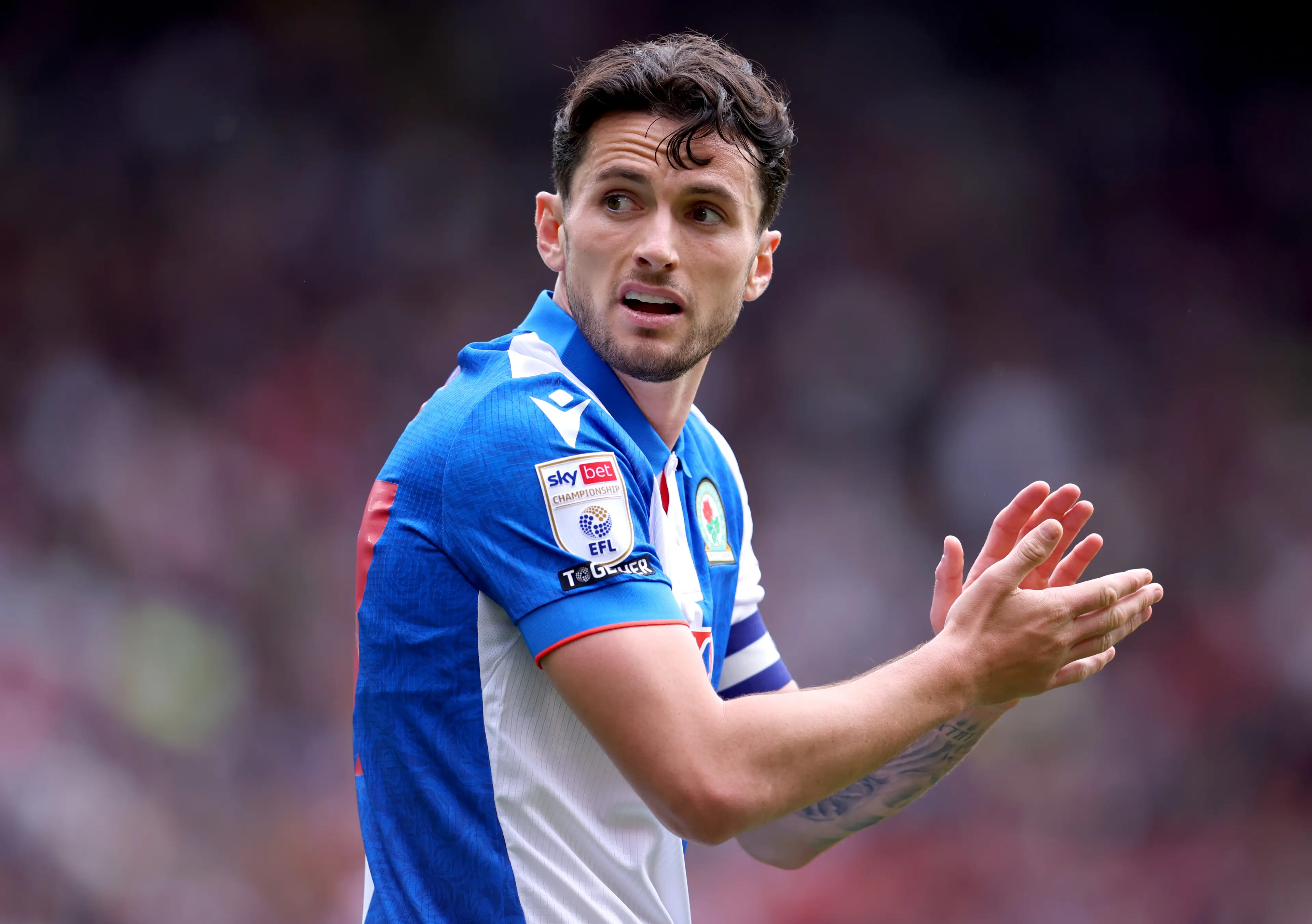 Blackburn Rovers captain Lewis Travis is wanted by Wrexham this summer. Image: Getty 
