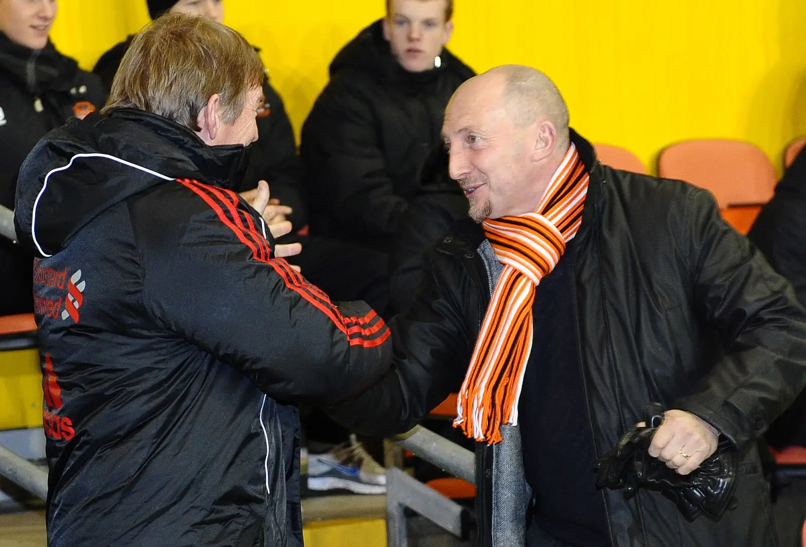 Blackpool manager Ian Holloway (R) greets Liverpool manager Kenny Dalglish before their English Premier League football match at Bloomfield Road, (Getty Images)