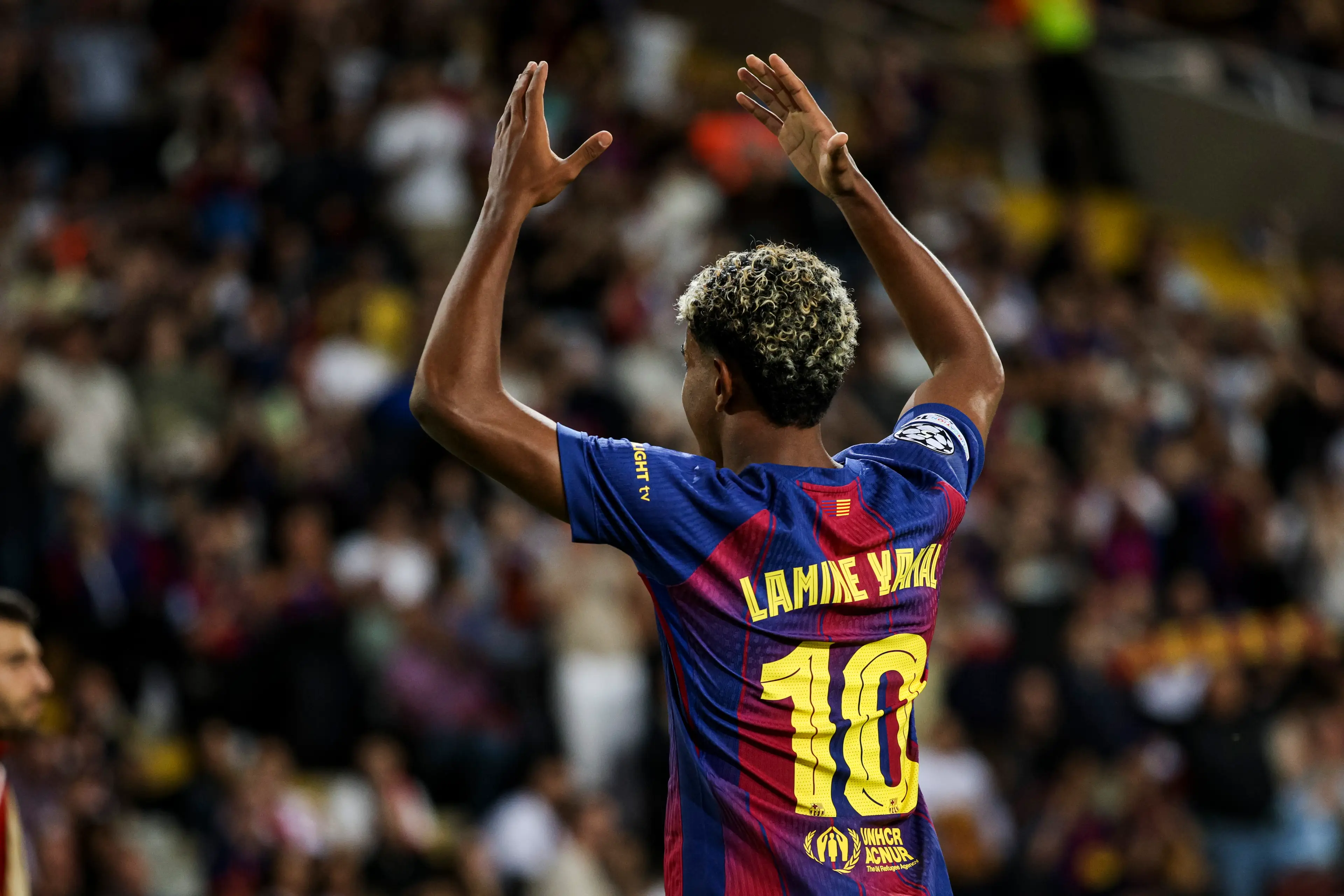 Lamine Yamal celebrates scoring a goal against Olympiacos in the Champions League. Image: Getty 