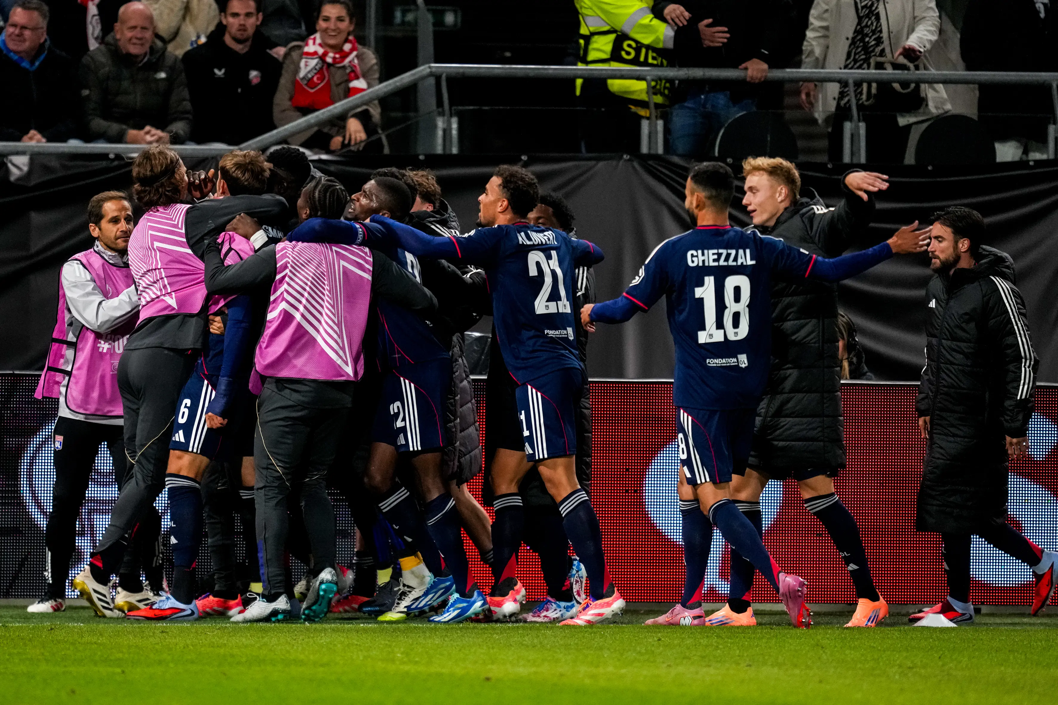 Lyon players celebrate Tanner Tessmann's winner against Utrecht. Image credit: Getty