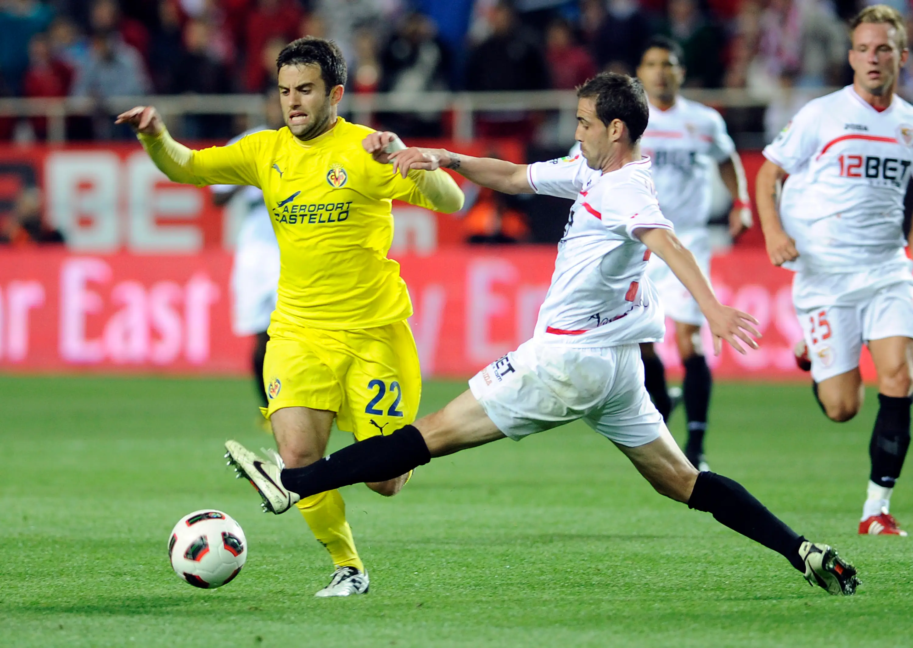 Fernando Navarro (right) in action for Sevilla (