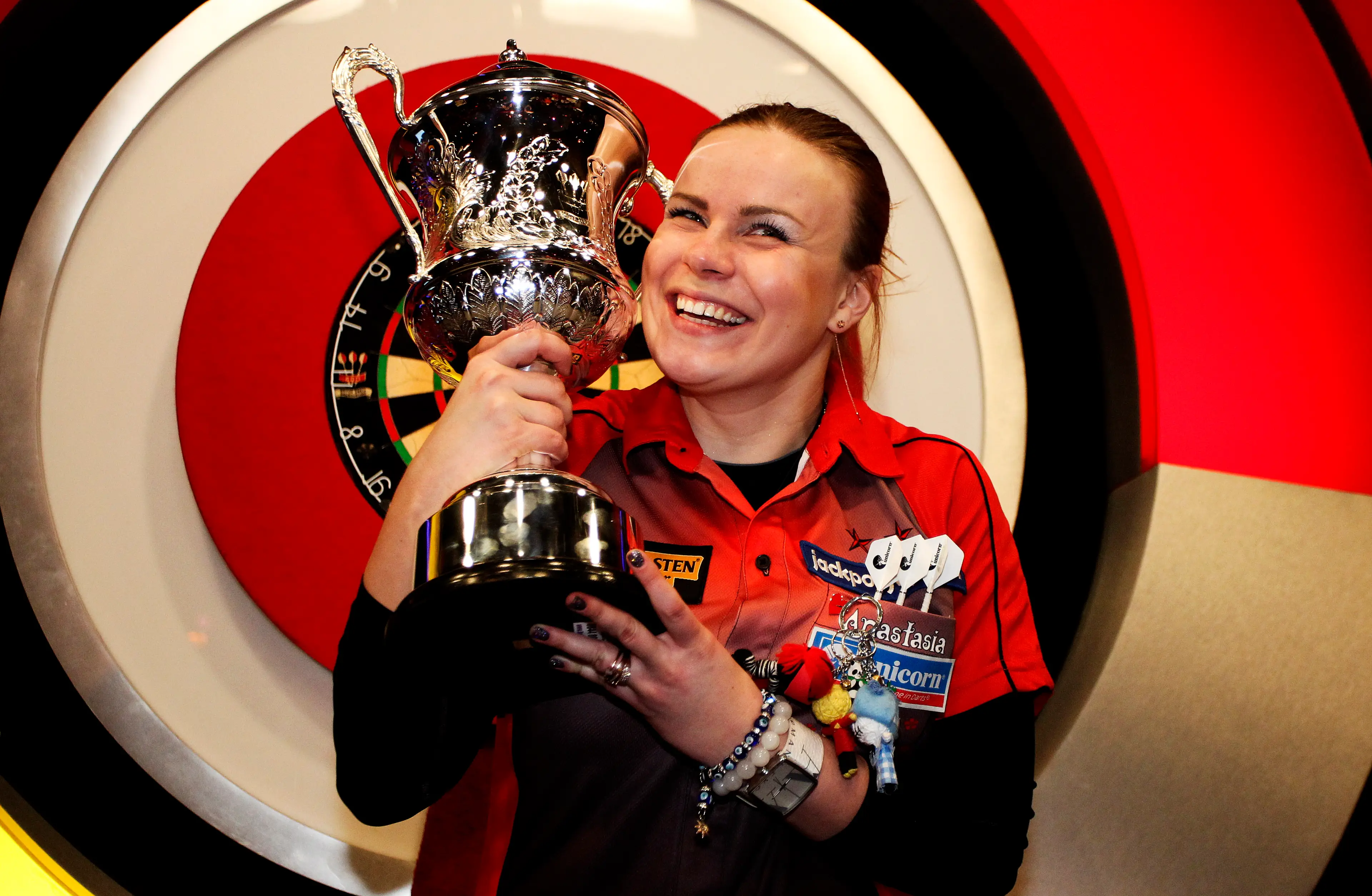 Dobromyslova celebrates winning BDO Lakeside World Professional Darts Championship in 2013. Image credit: Getty