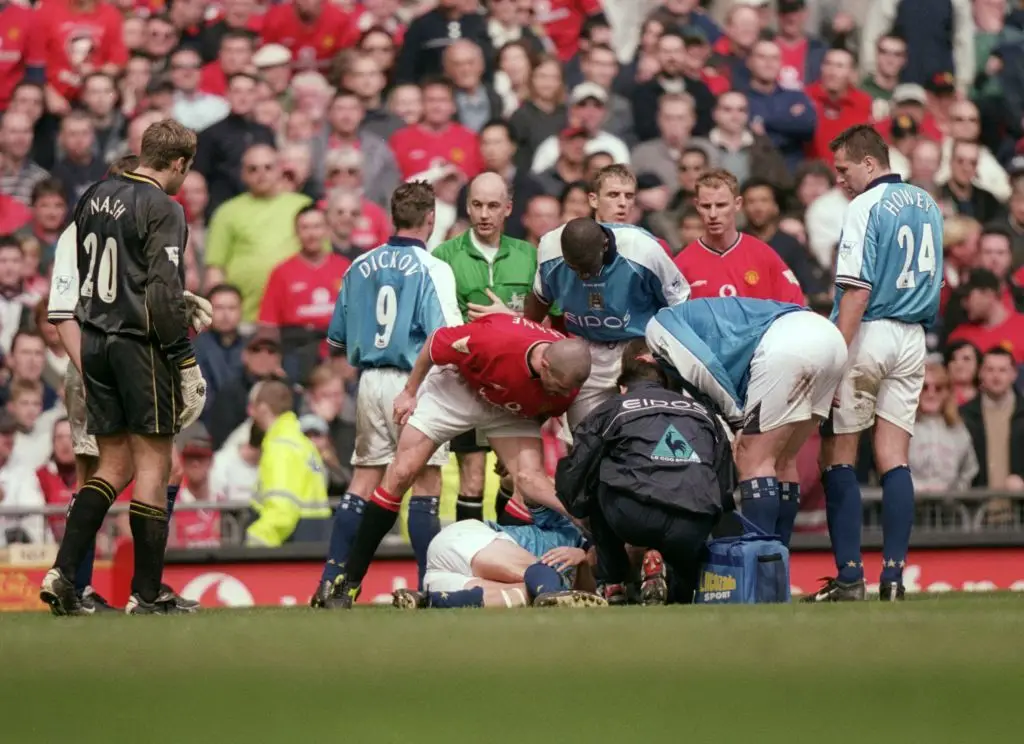 Roy Keane's brutal tackle on Alf Inge Haaland is one of the most famous in Premier League history. (Image: Gary M Prior/Allsport via Getty)
