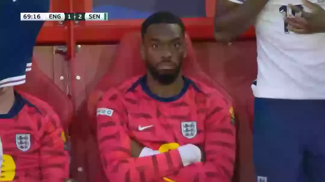 Toney cut a frustrated figure on the bench. Image credit: ITV