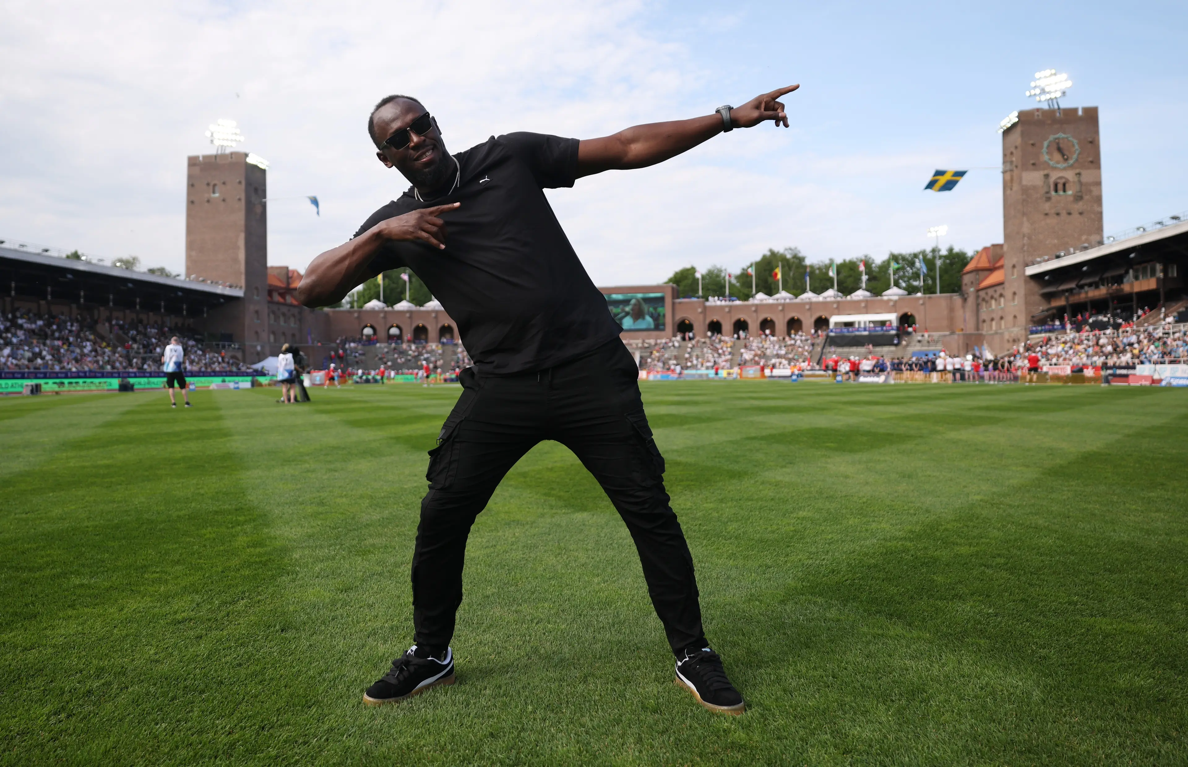 Usain Bolt poses at a Diamond League meet. Image:  Maja Hitij / Staff via Getty