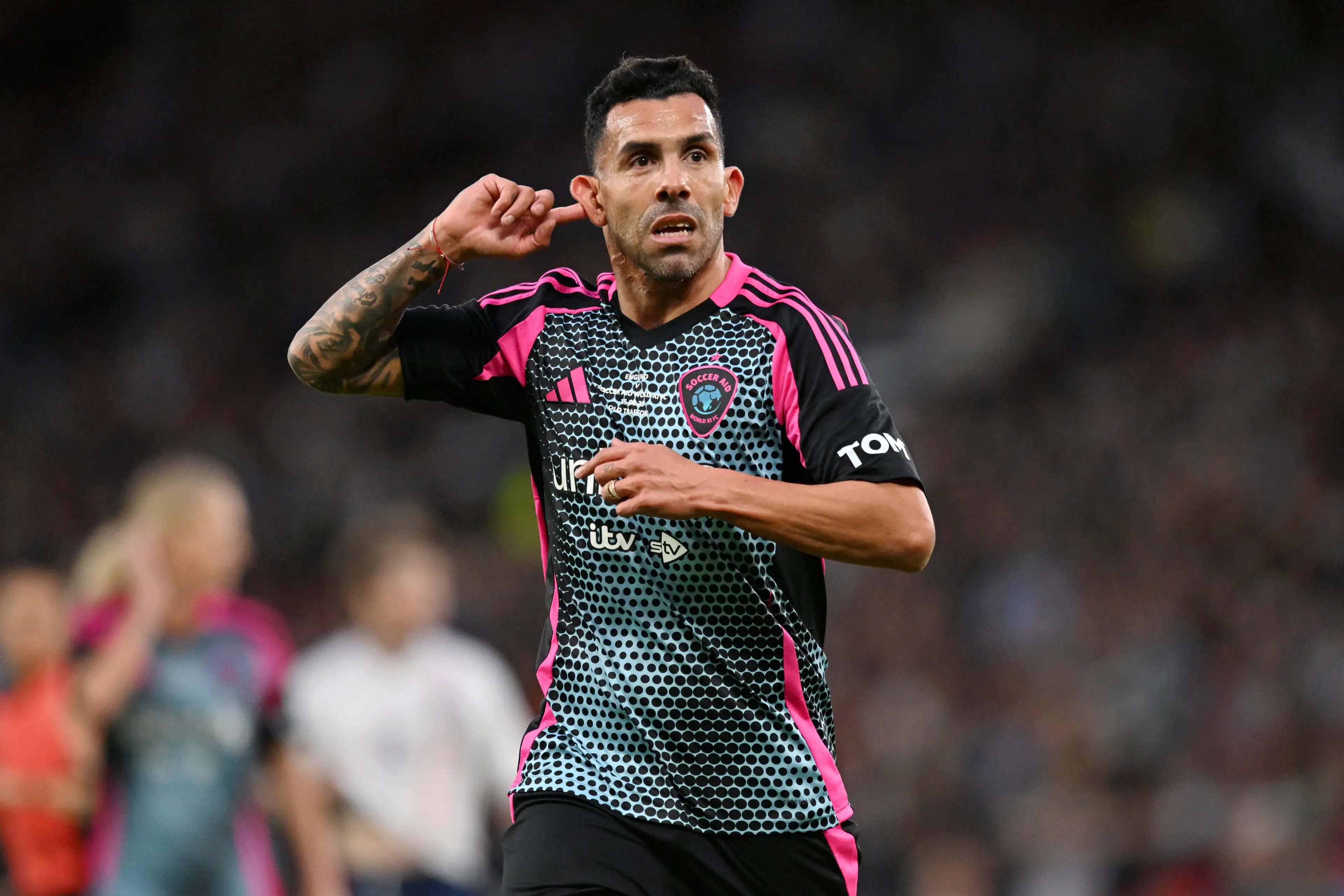 Carlos Tevez celebrates scoring for World Xi at Soccer Aid. Image: Getty 