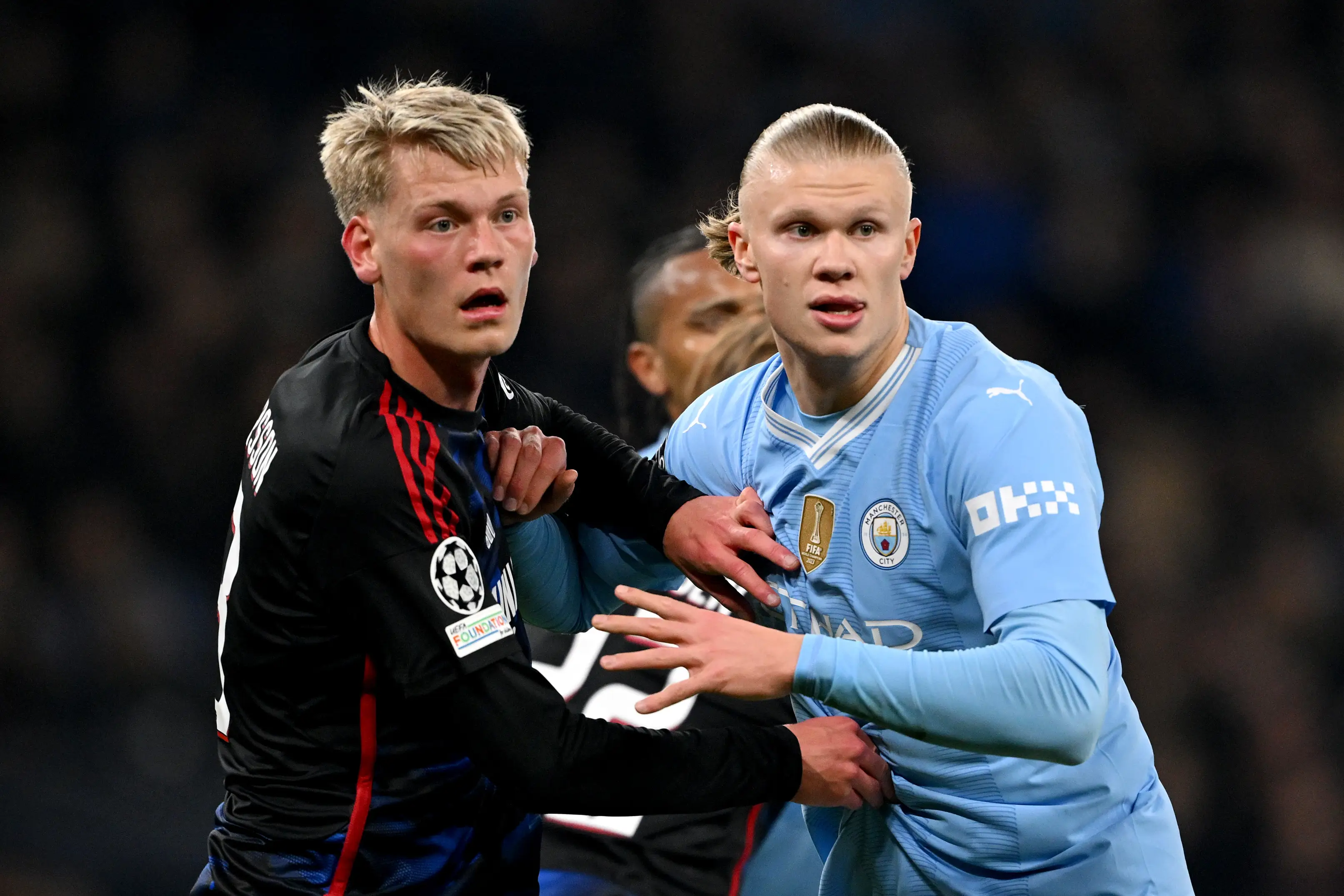 Orri Oskarsson battles for the ball with Erling Haaland during a Champions League tie between FC Copenhagen and Manchester City -