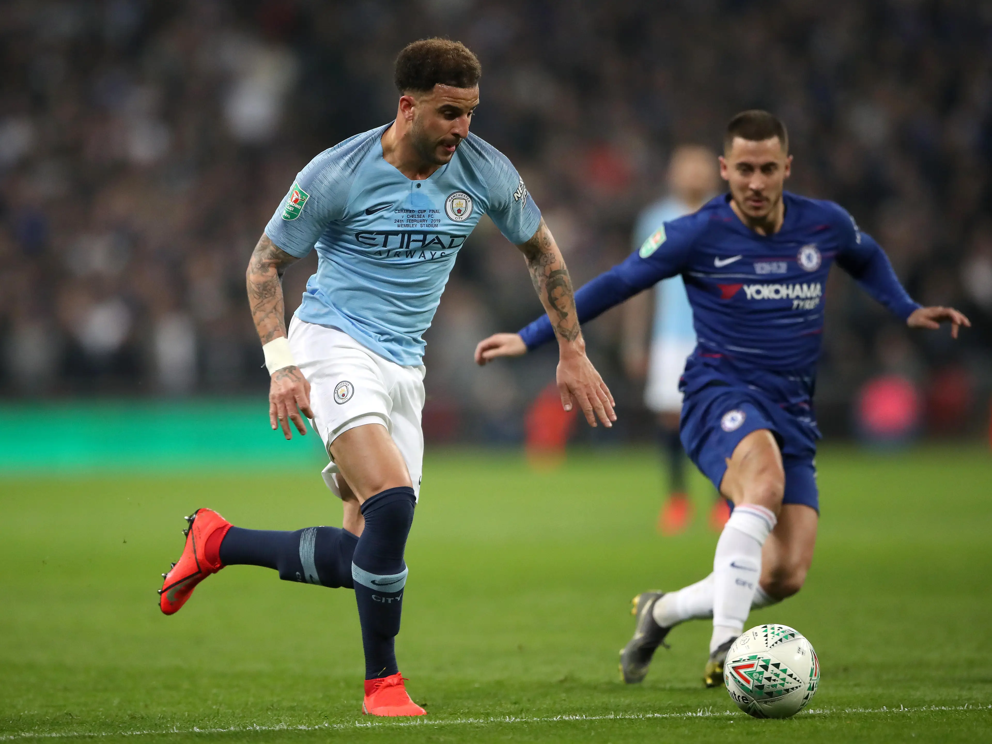 Manchester City's Kyle Walker (left) in action with Chelsea's Eden Hazard during the Carabao Cup Final at Wembley Stadium.