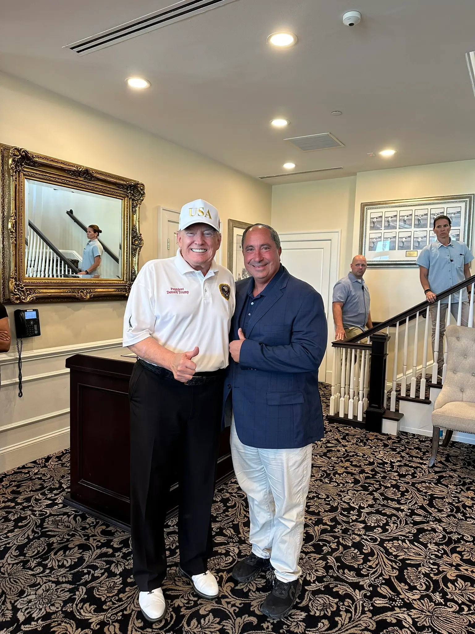 Fredericks and Trump pose together for a picture. Image: John Fredericks