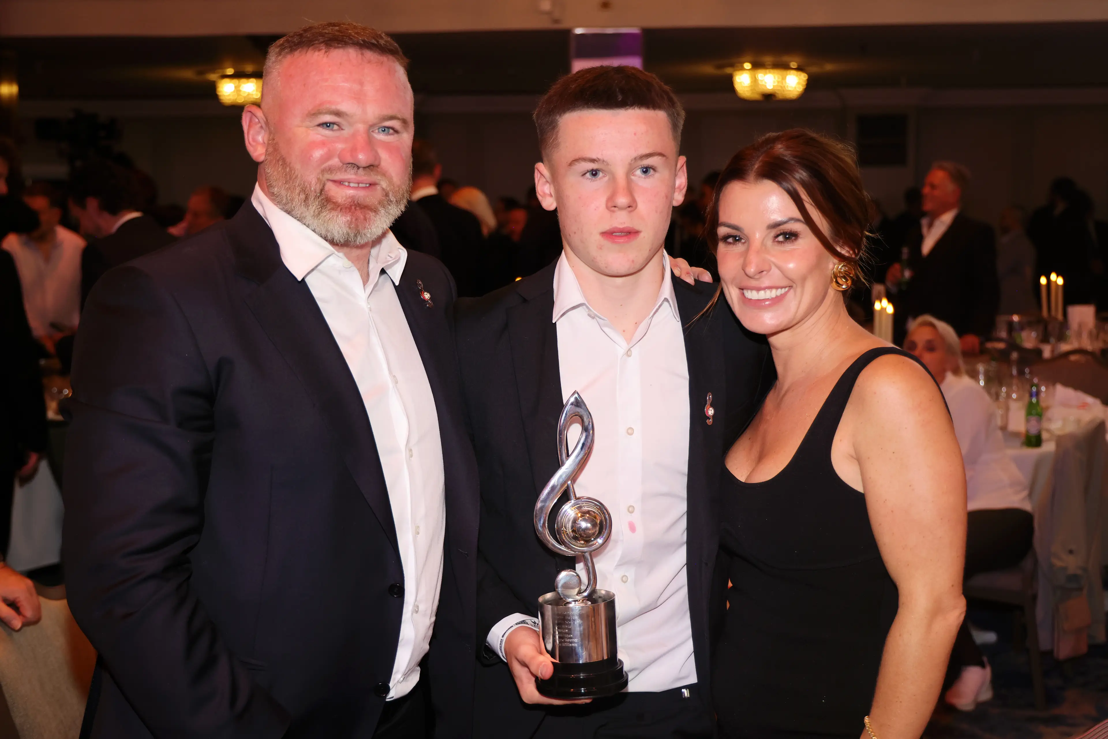 Wayne Rooney, Kai Rooney and Coleen Rooney during Nordoff Robbins' Legends of Football at JW Marriott Grosvenor House. Image credit: Getty