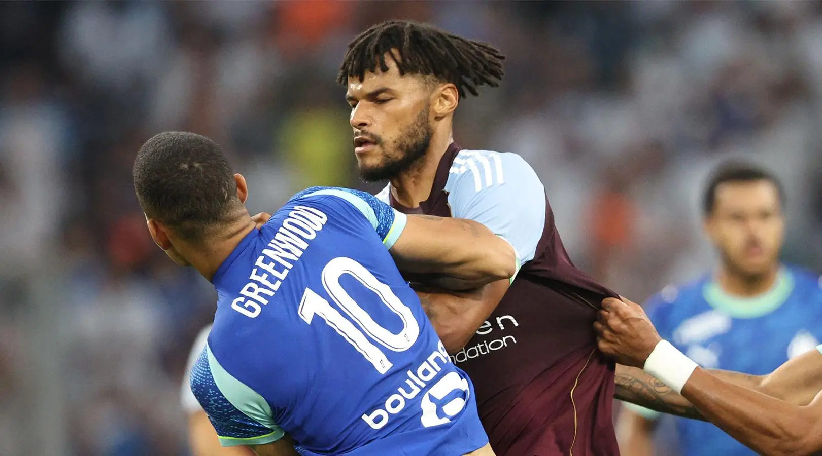 Tyrone Mings gripped Mason Greenwood by his shirt. Image: Getty