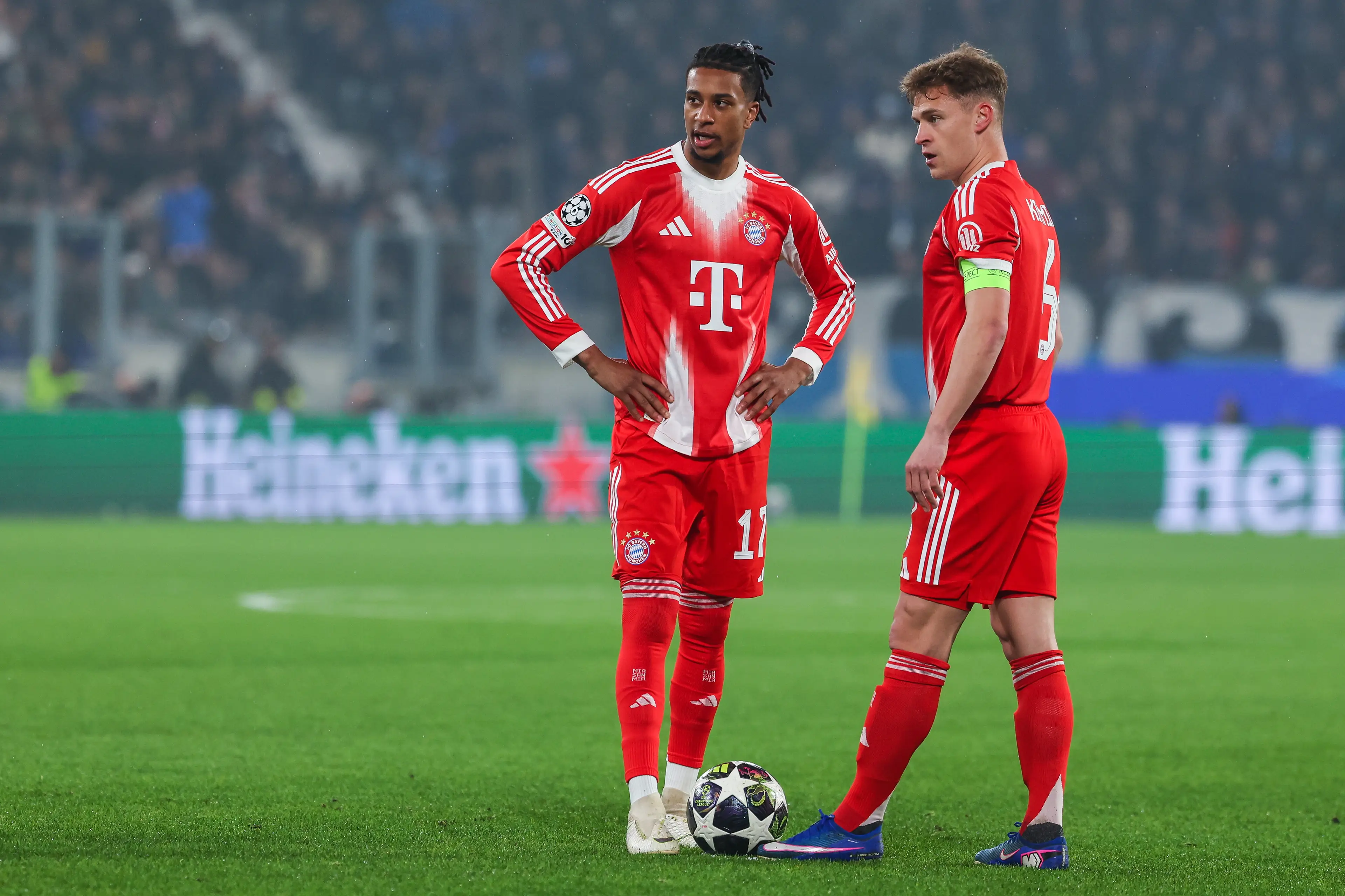 Michael Olise and Joshua Kimmich were booked against Atalanta. Image: Getty
