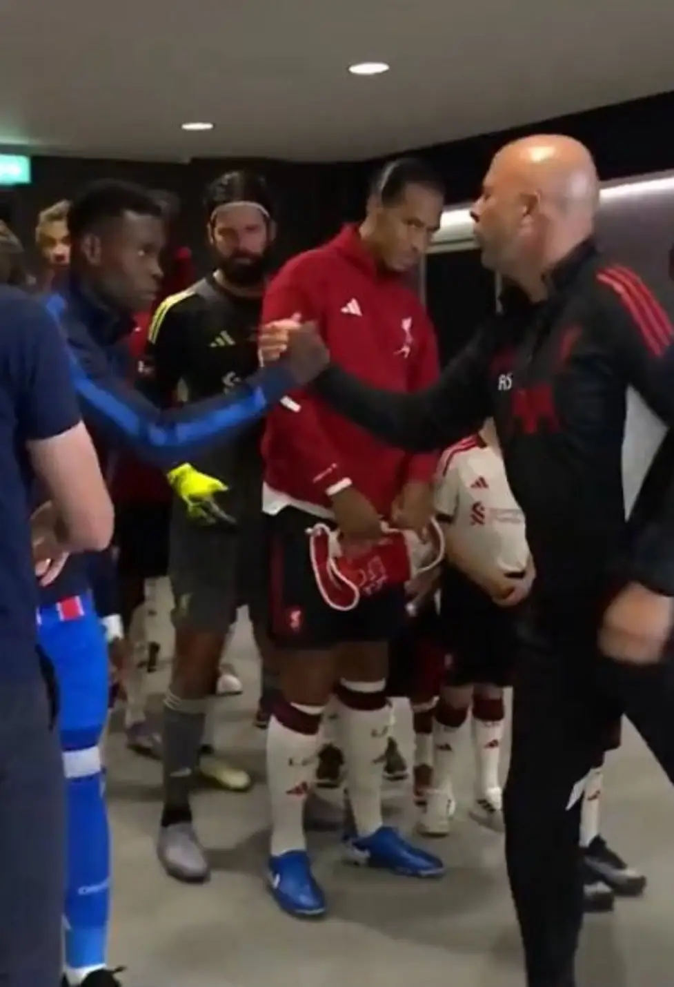 Virgil van Dijk reacted to Arne Slot's handshake with Marc Guehi. Image: Getty