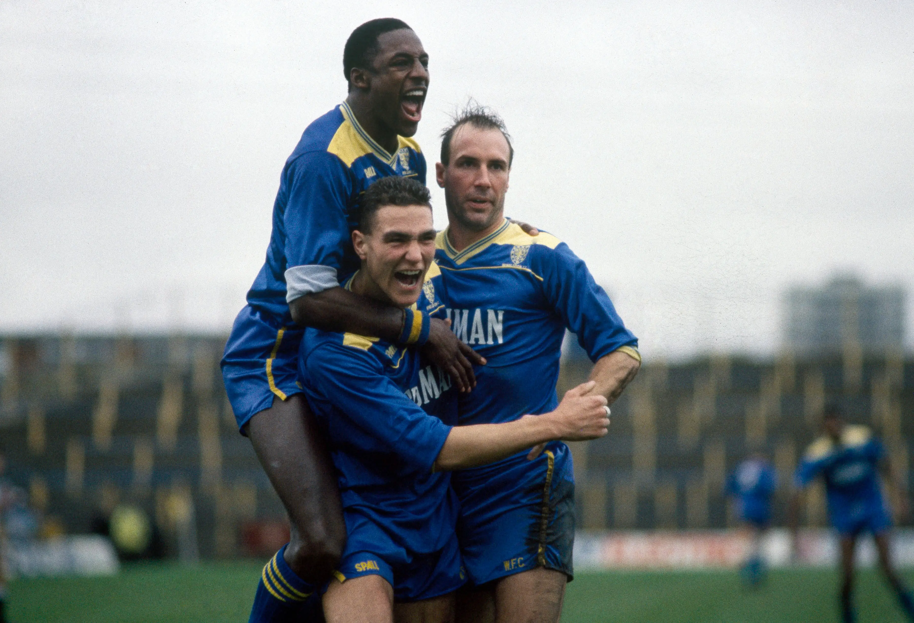 John Fashanu, Vinnie Jones and Alan Cork celebrate a Wimbledon goal. Image: Getty 