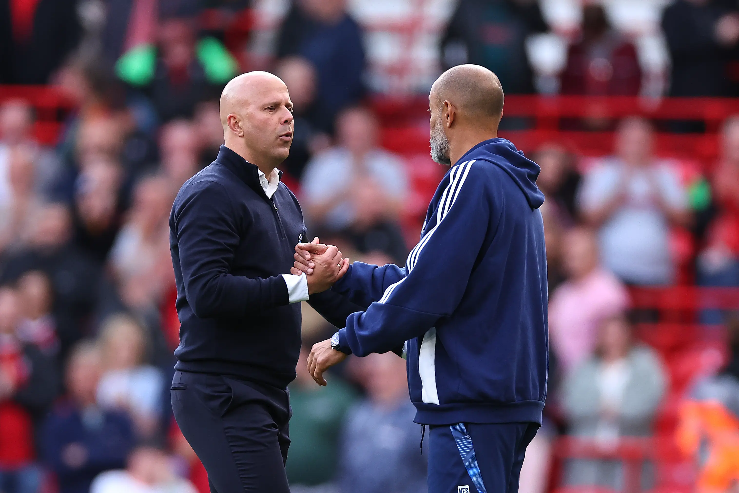 Arne Slot and Nuno Espírito Santo share an exchange following Liverpool vs. Nottingham Forest. Image: Getty 