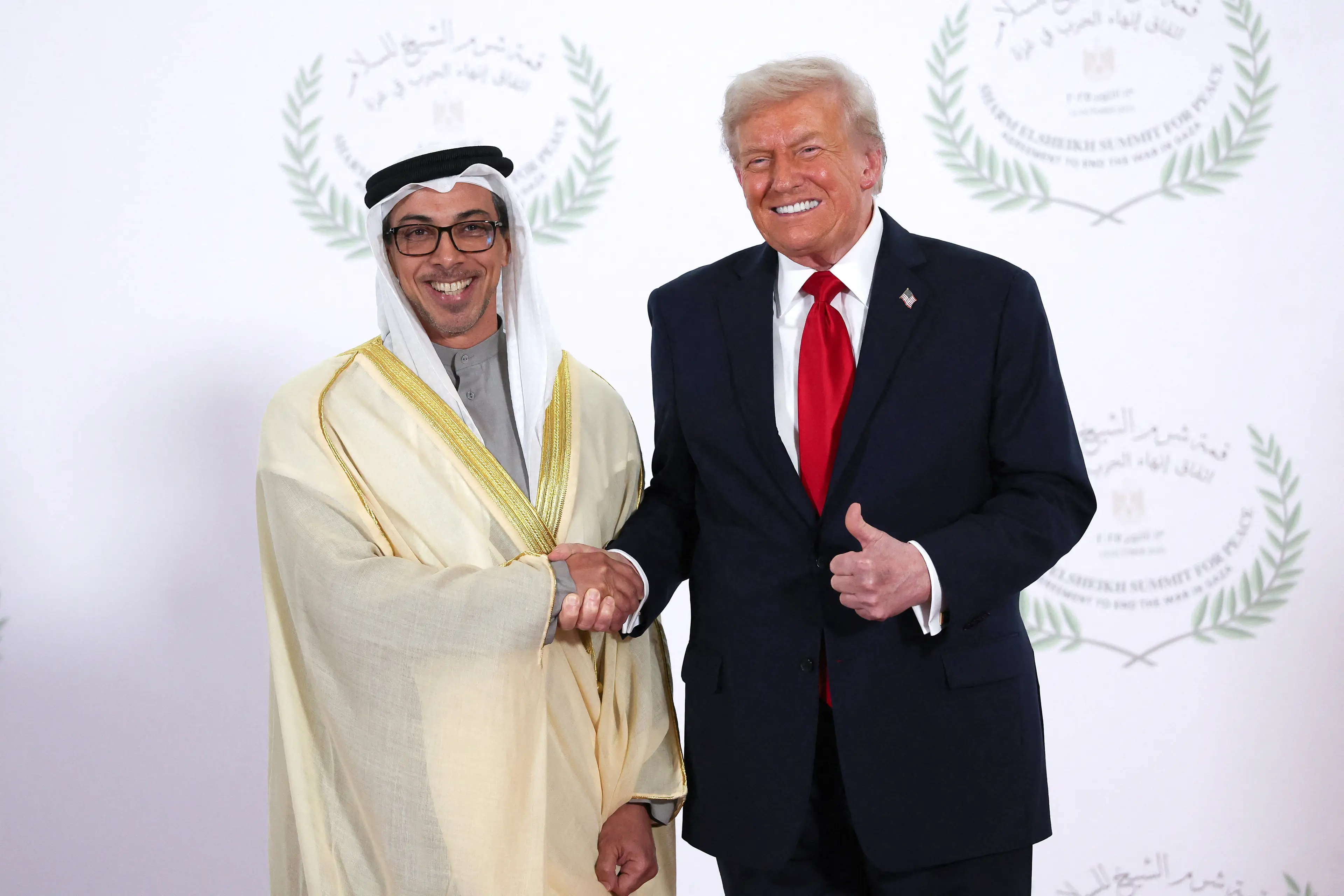 Sheikh Mansour and Donald Trump shared an embrace at the Gaza peace summit. Image: Getty