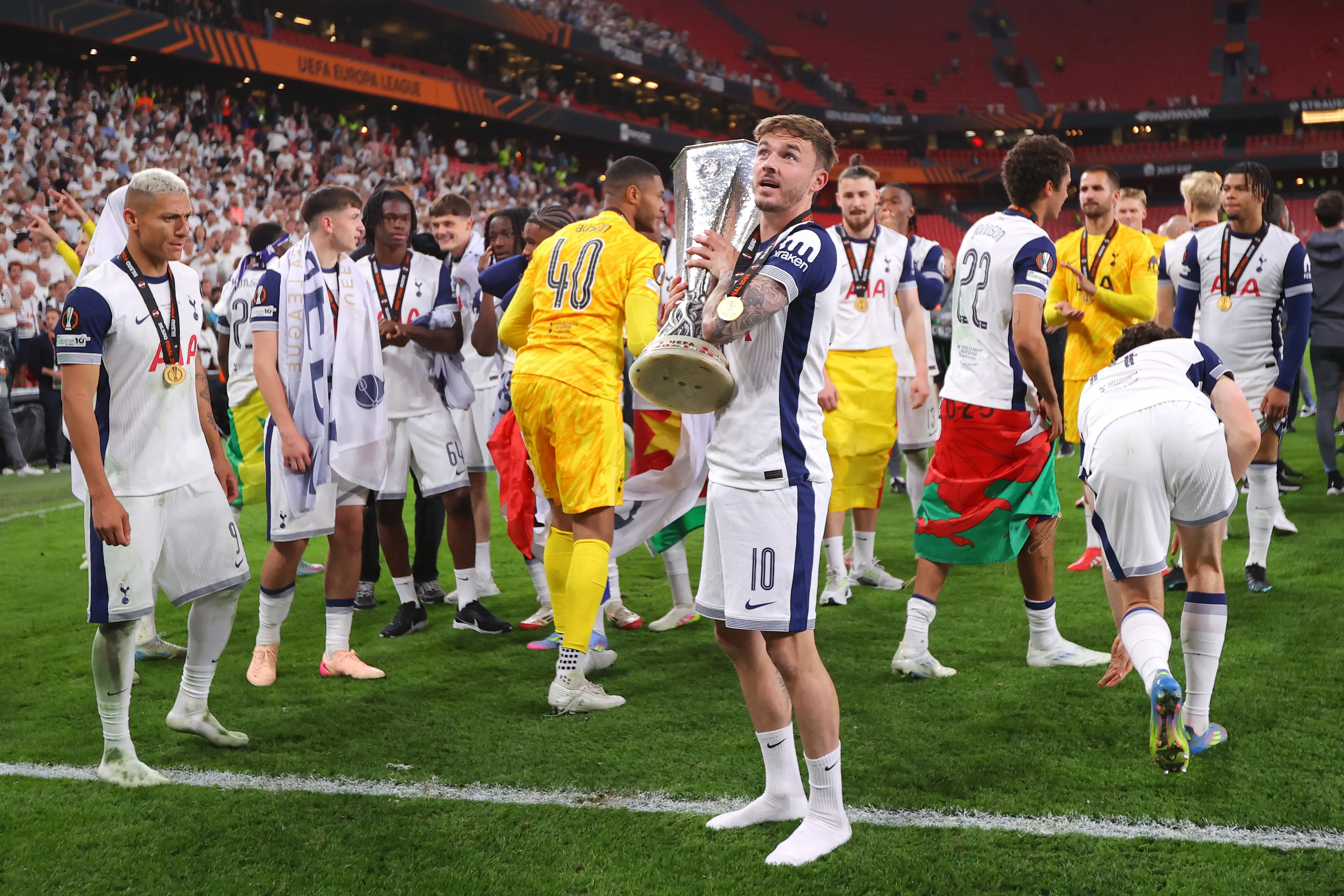 James Maddison wore his full kit for Spurs' Europa League trophy presentation. Image: Getty 
