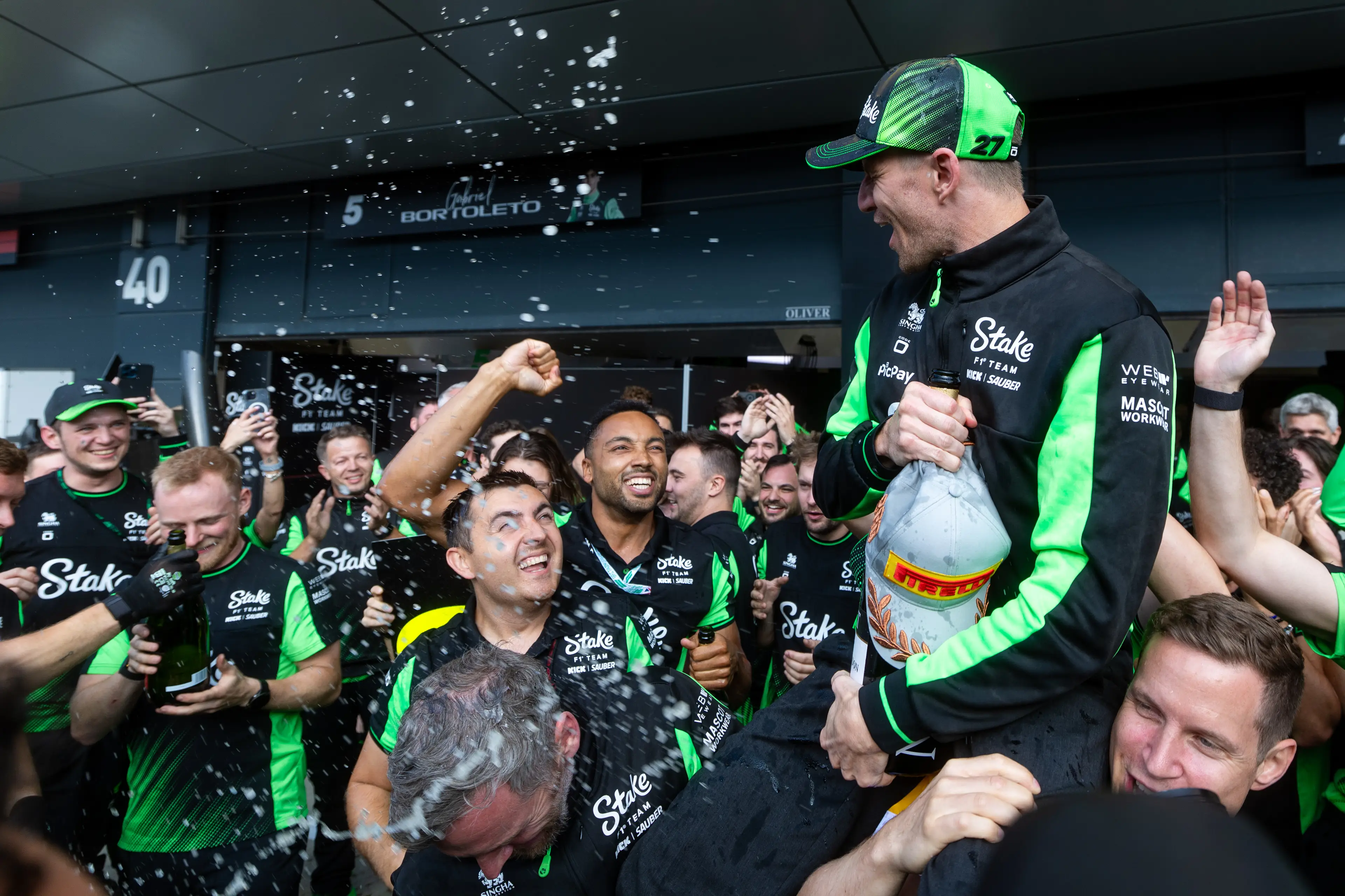 Nico Hulkenberg celebrates finishing third at the British Grand Prix. (Image: Getty)