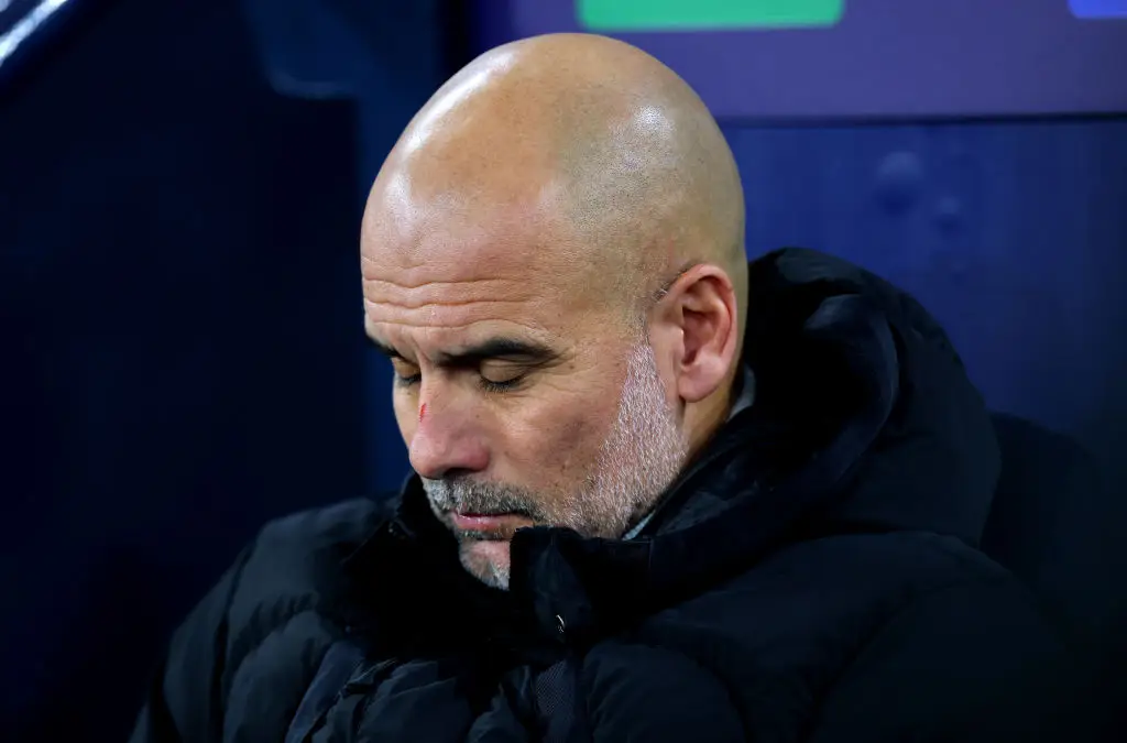 Man City boss Pep Guardiola has been seen with scratches on his nose and head in recent weeks. (Image: Getty)