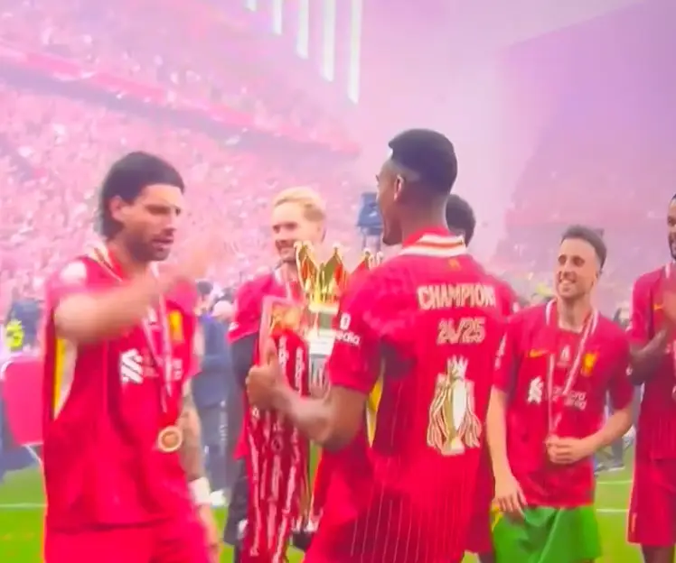 Dominik Szoboszlai did not appear to want to lift the Premier League trophy in front of the Kop. Image: Getty