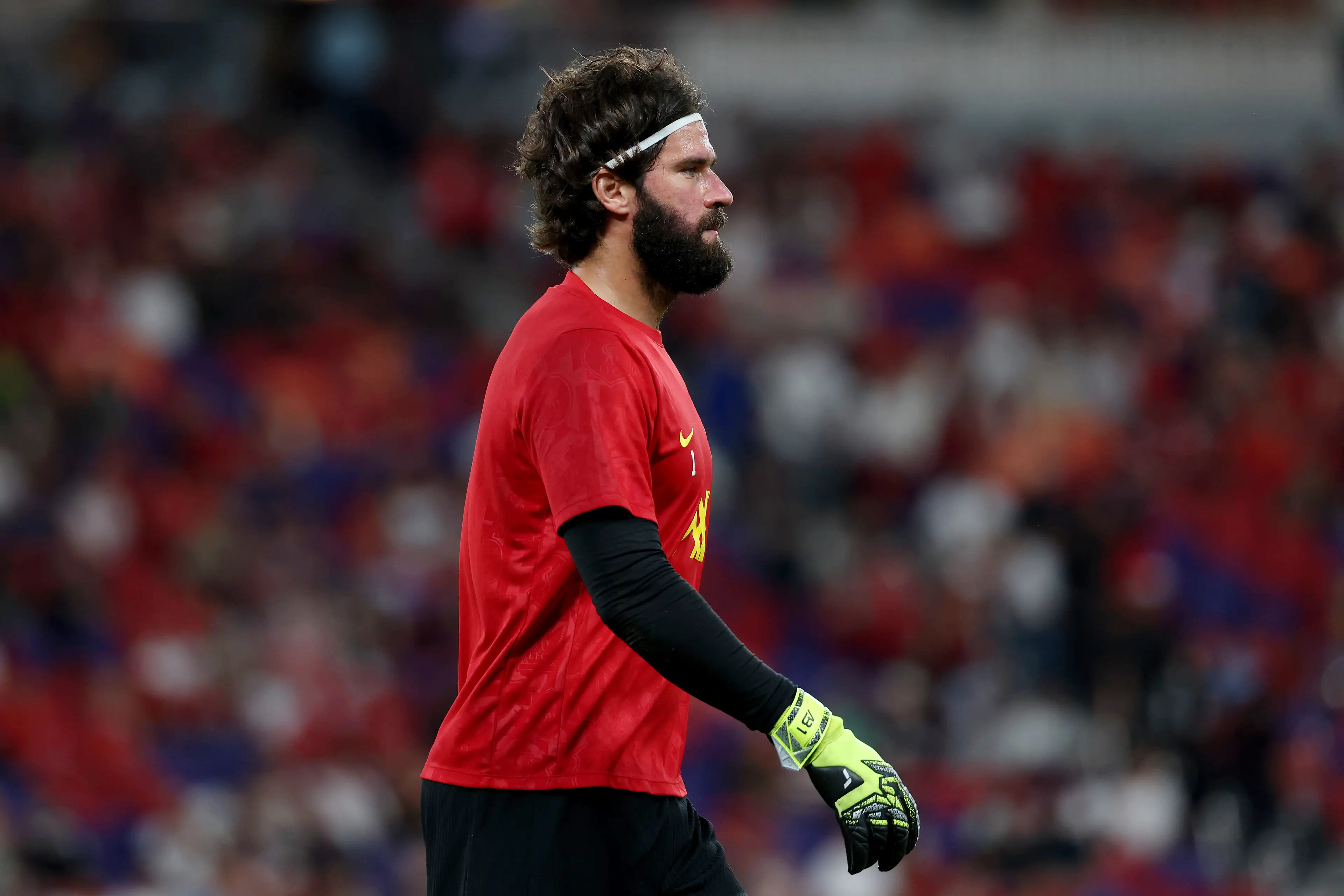 Alisson is expected to reunite with his teammates in the UK. Image: Getty