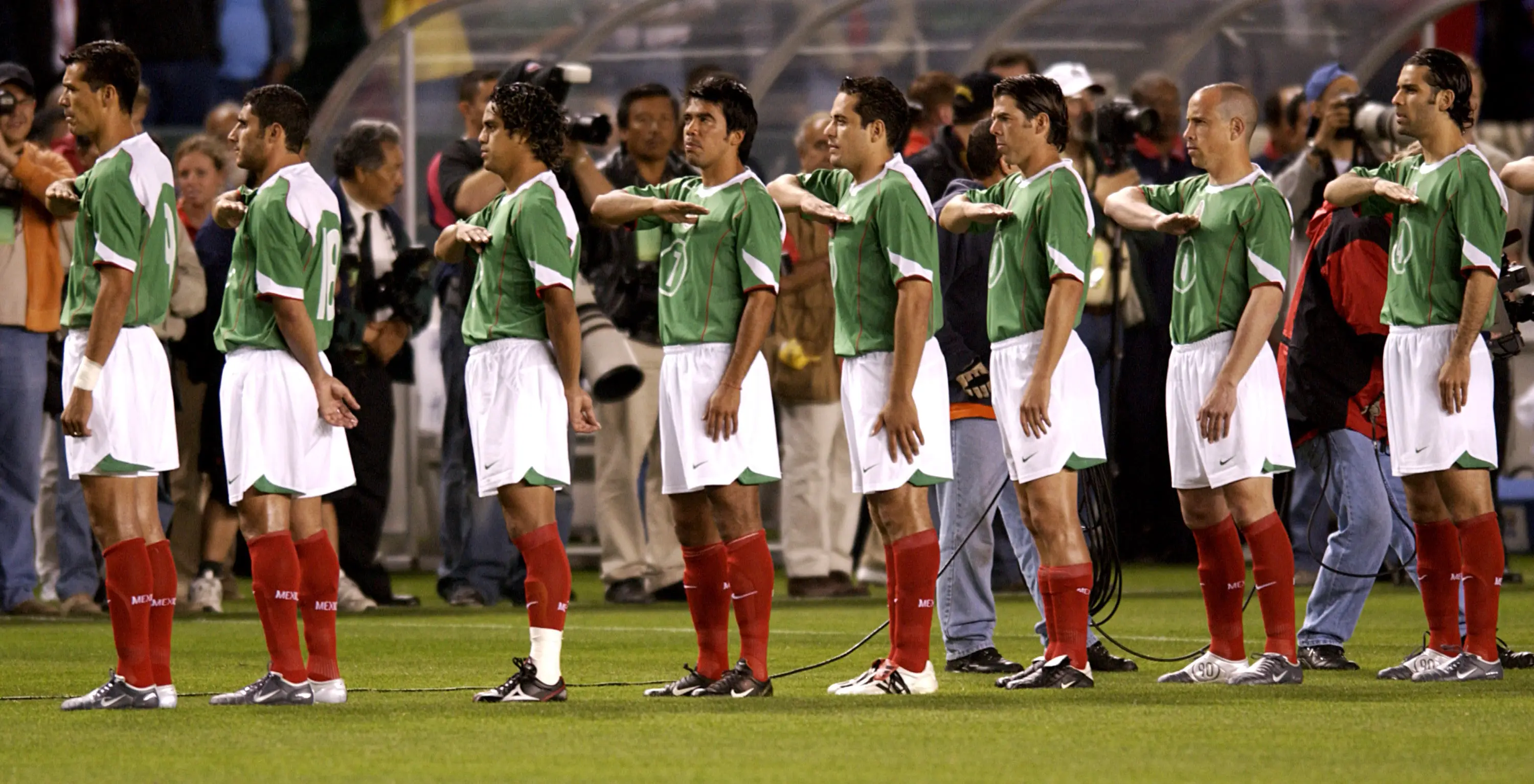 Mexico players show their respect to their national anthem. Image: Getty