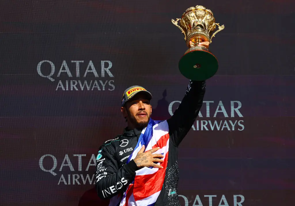 Lewis Hamilton celebrates after winning the 2024 British GP (Image: Getty)