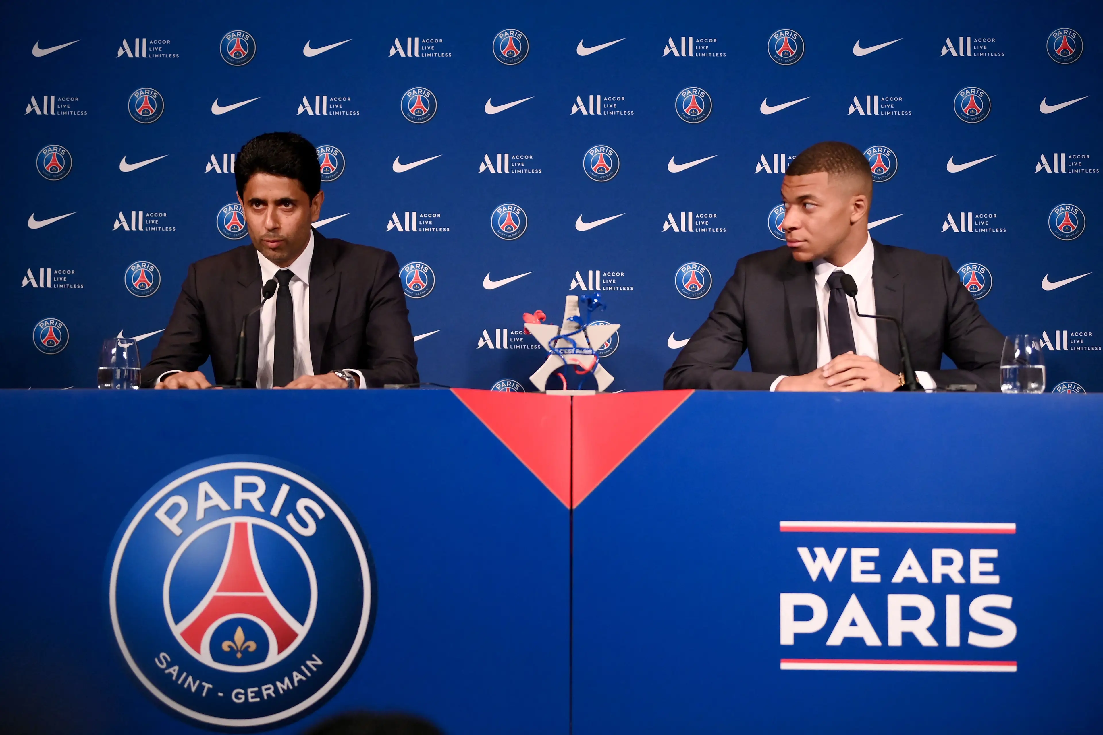 Nasser Al-Khelaifi with Kylian Mbappe during a press conference. Image: Getty