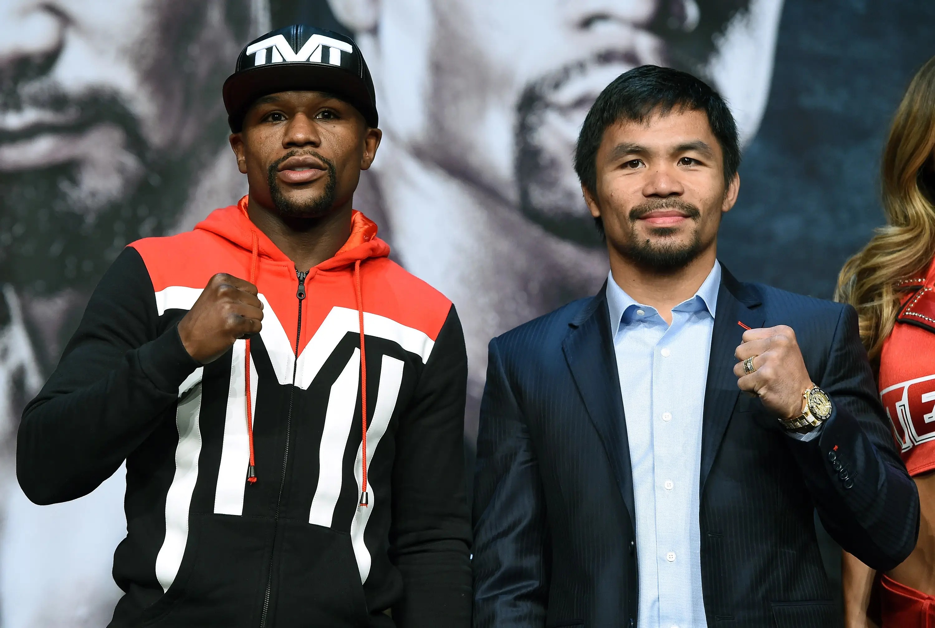 Floyd Mayweather and Manny Pacquiao pose for photos for their 2015 fight. Image: Getty 