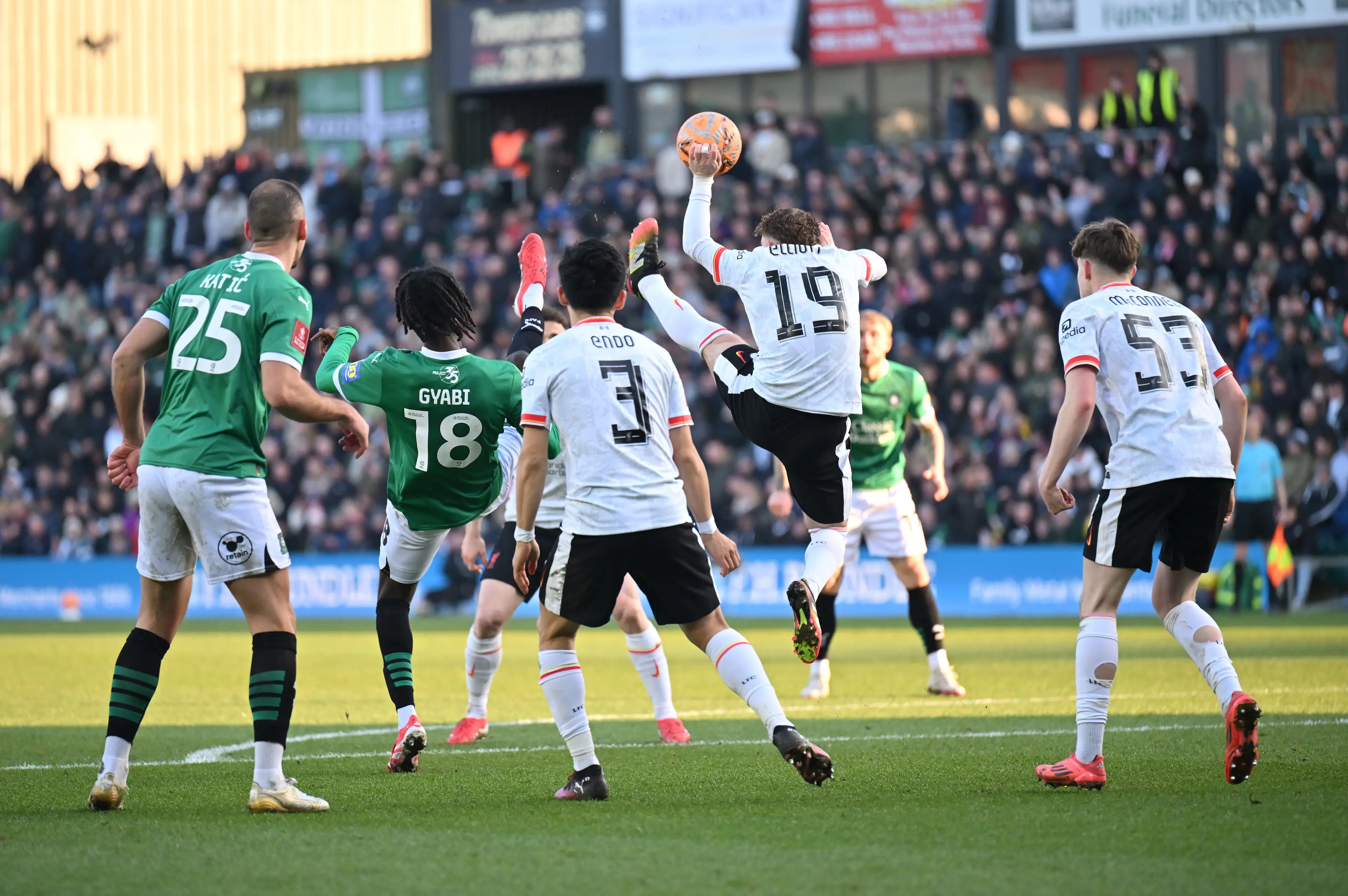 Harvey Elliott handles the ball to concede a penalty. Image: Getty 