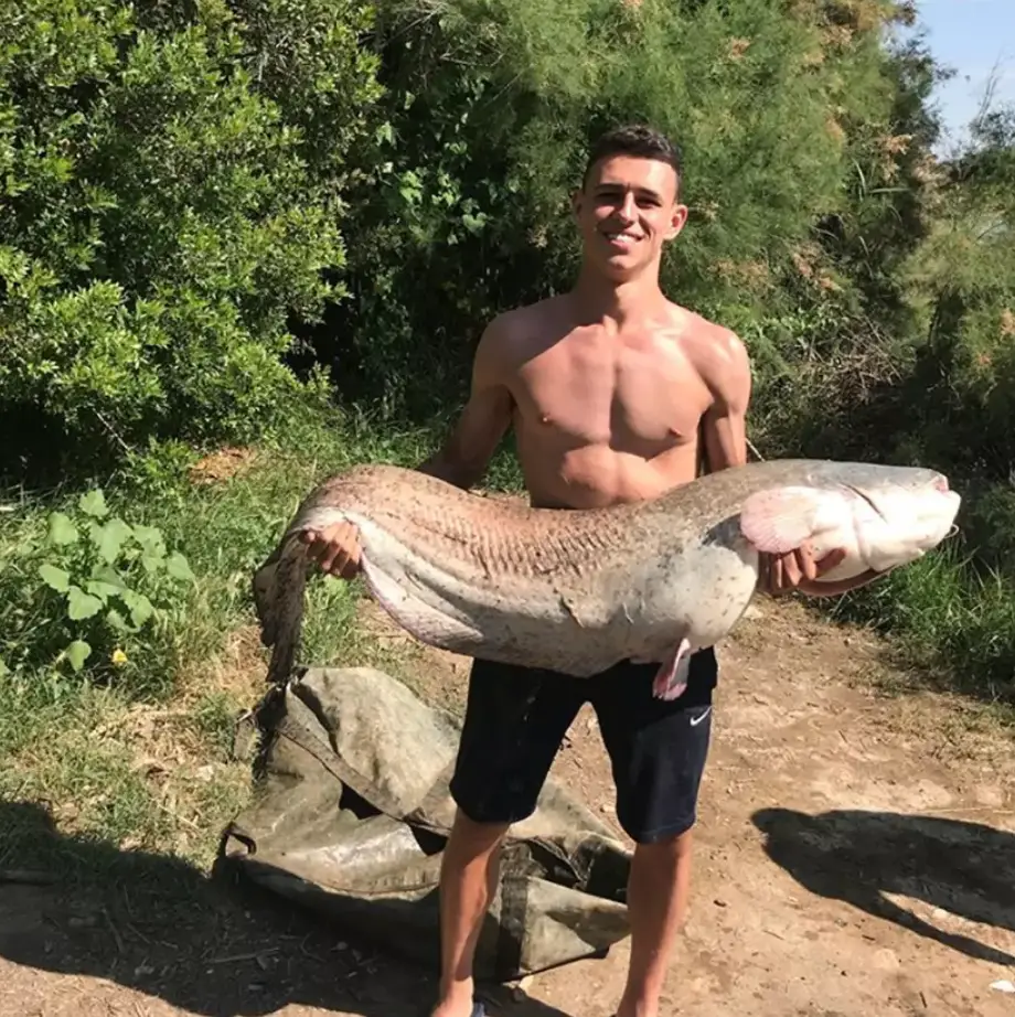 Phil Foden shows off a big catch. Image: Instagram/Phil Foden 