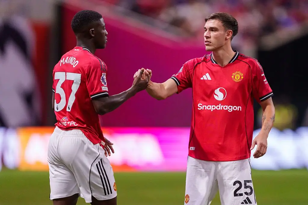 Man Utd midfielders Kobbie Mainoo and Manuel Ugarte pictured against Everton (Image: Getty)