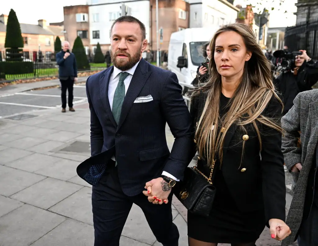 Conor McGregor and fiancee Dee Devlin pictured attending a civil court hearing (Image: Getty)